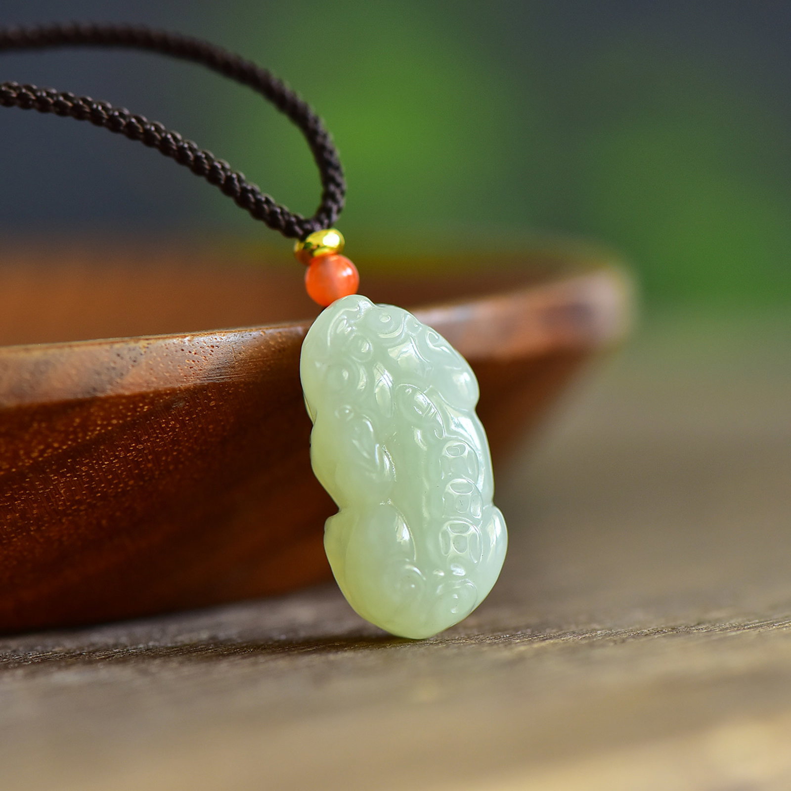 An Exquisite Greenish Jade Auspicious Beast Pendant: An Exquisite Greenish Jade Auspicious Beast Pendant,Size:27mmx38mm,Weight:8g 青白玉瑞兽吊坠