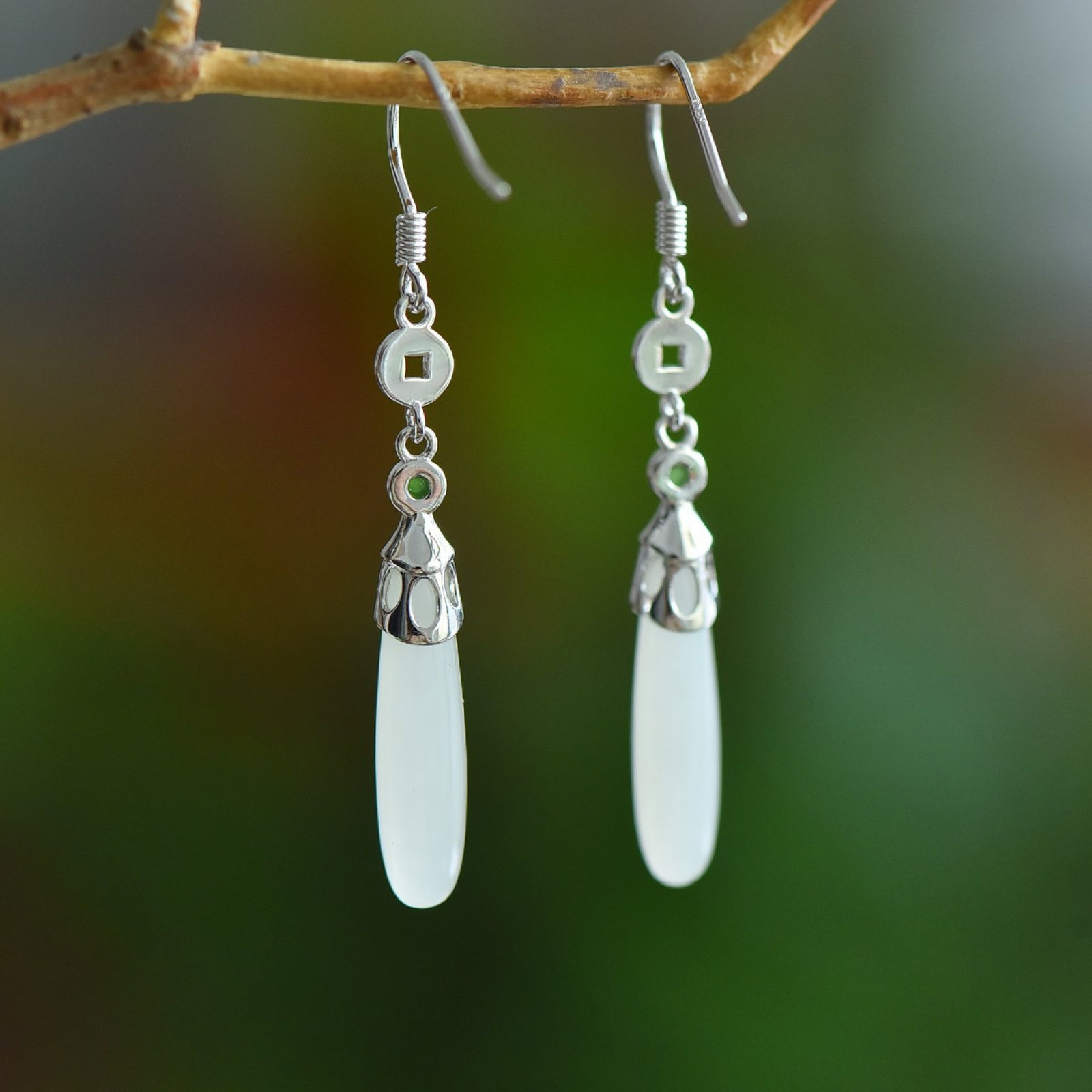 A Pair of Exquisite Sterling Silver Inlaid White Jade Earrings: A Pair of Exquisite Sterling Silver Inlaid White Jade Earrings,Size:5mmx20mm 一对纯银镶白玉耳环