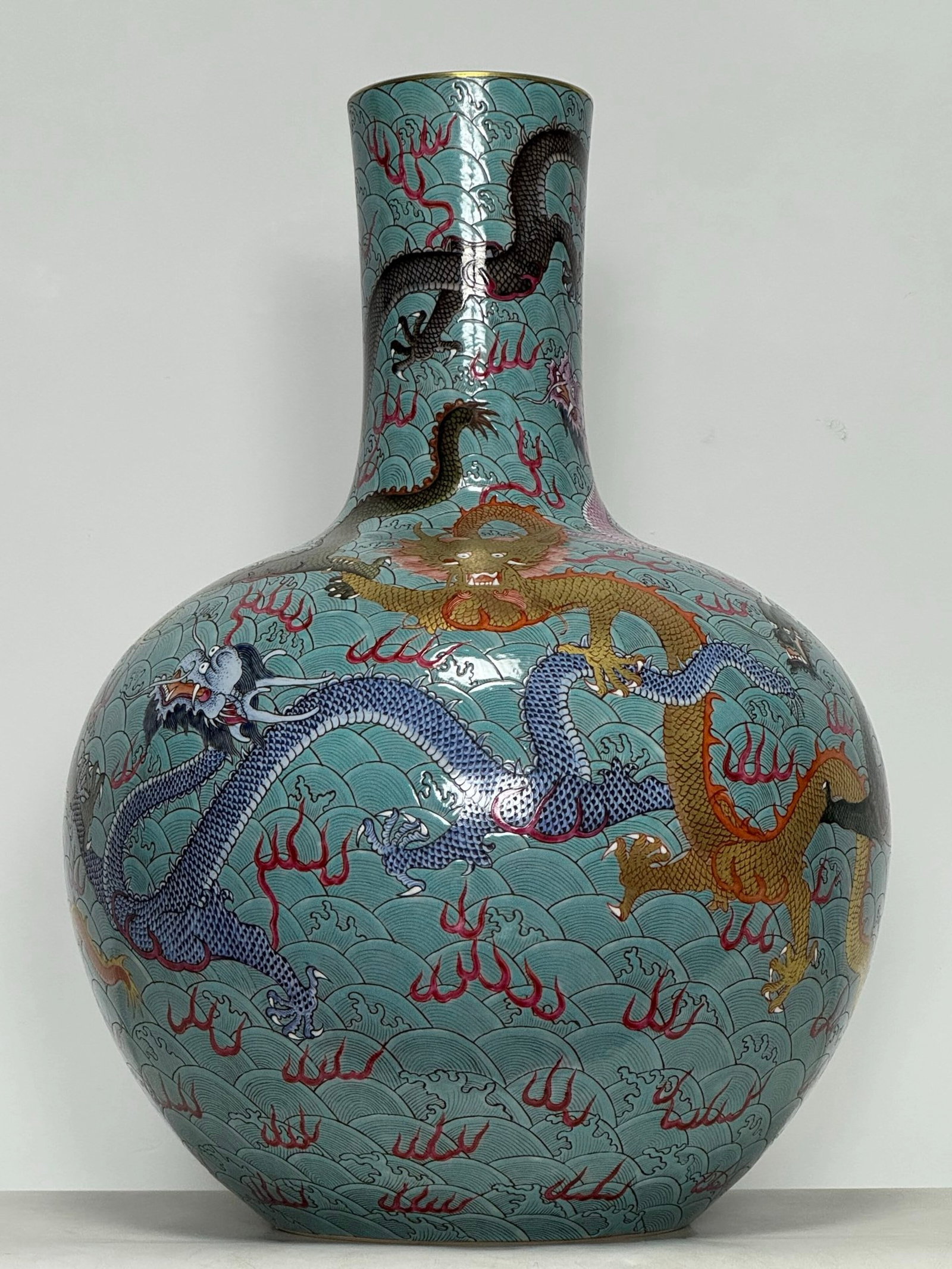 A Huge Famille-Rose Green Ground Painted Gold Seawater Dragon Pattern Vase: A Huge Famille-Rose Green Ground Painted Gold Seawater Dragon Pattern Vase,Qing Dynasty,China,Qianlong Six-character Mark,Size:21.1inx15.4in 粉彩绿地描金海