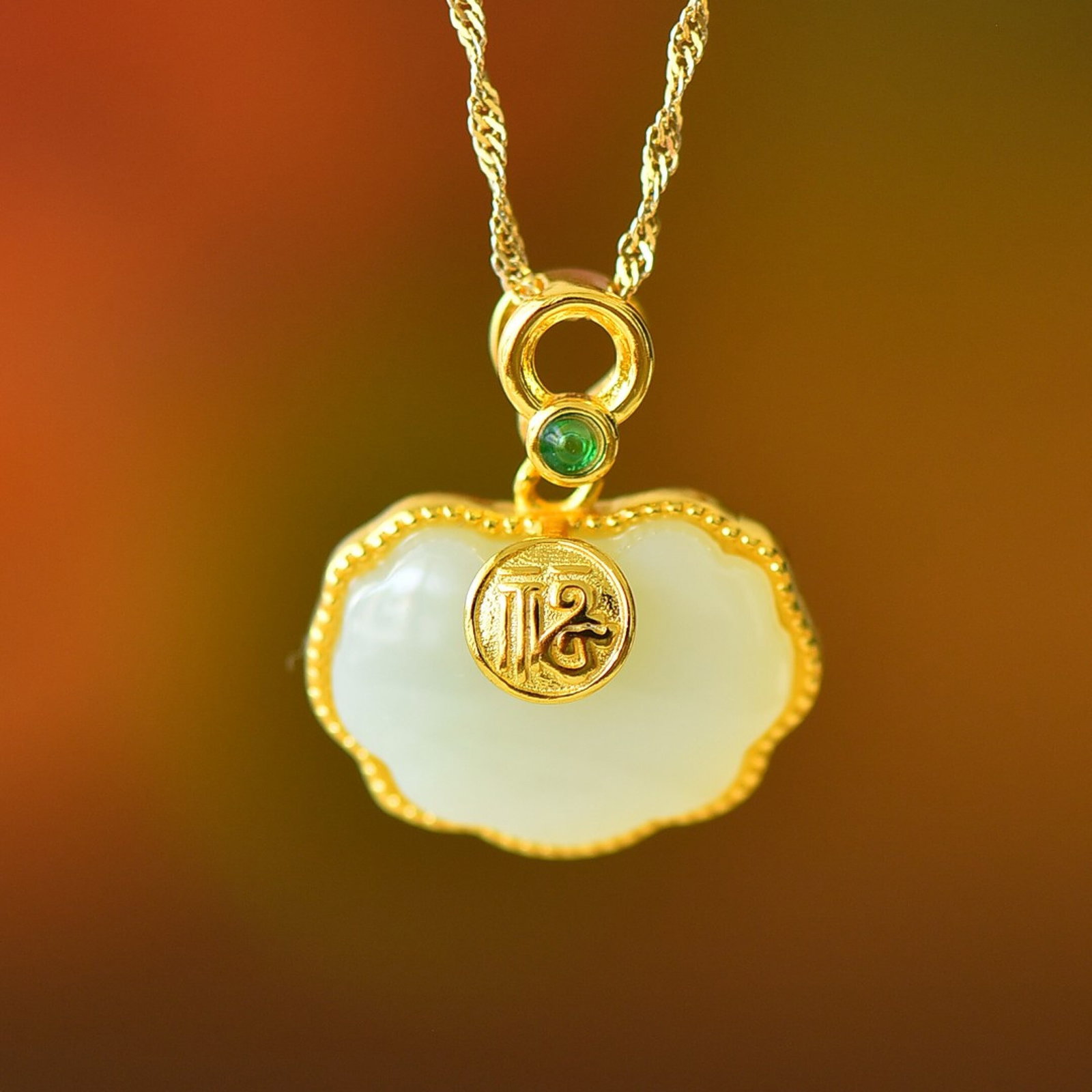 An Exquisite Sterling Silver-Gold Plated Inlaid White Jade Pendant: An Exquisite Sterling Silver-Gold Plated Inlaid White Jade Pendant 纯银镀金镶白玉吊坠