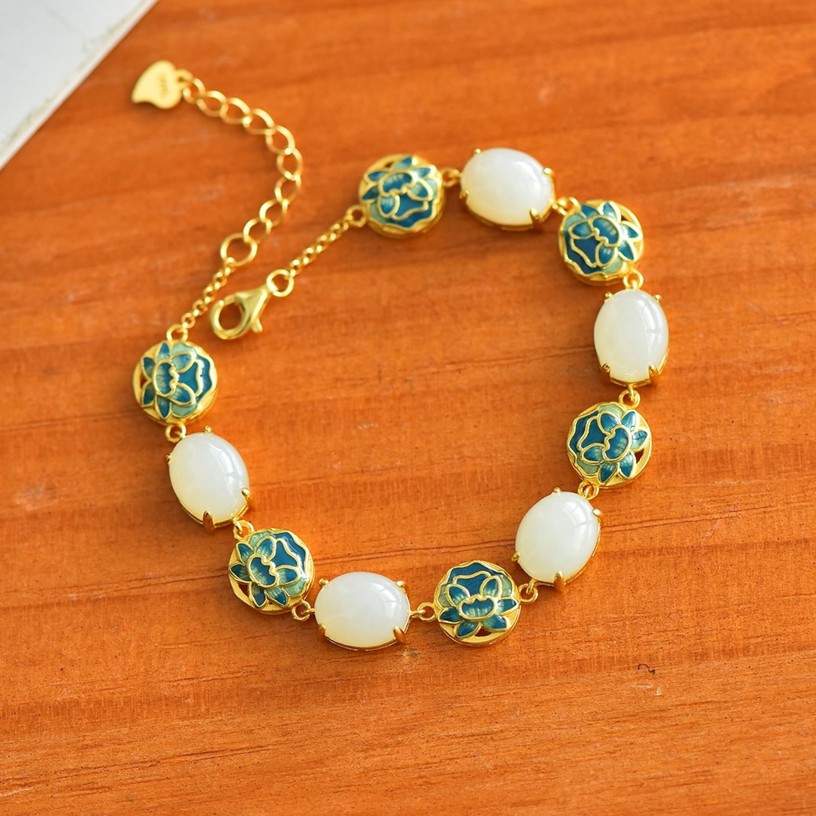 An Exquisite Sterling Silver-Gold Plated Inlaid White Jade Enamel Bracelet: An Exquisite Sterling Silver-Gold Plated Inlaid White Jade Enamel Bracelet,Size:8mmx10mm 纯银镀金镶白玉珐琅手链