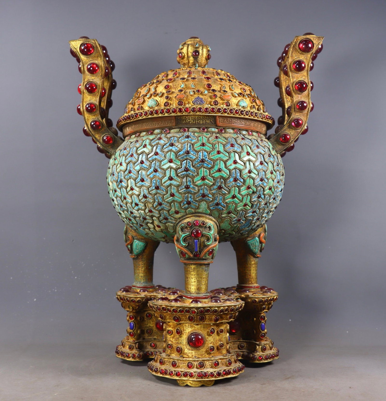 A Huge Gilt Bronze Double-Ears Tripod Censer,Inlaid Turquoise and Gems: A Huge Gilt Bronze Double-Ears Tripod Censer,Inlaid Turquoise and Gems,Qing Dynasty,China,Qianlong Four-character Mark,Size:16.9inx12.6inx11in,Weight:7360g 铜鎏金双耳