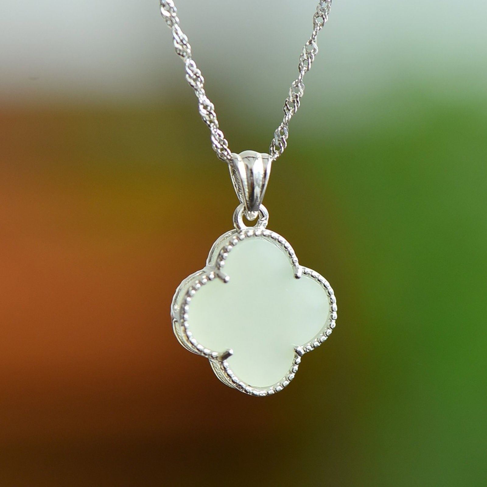 An Exquisite Sterling Silver Inlaid White Jade Pendant: An Exquisite Sterling Silver Inlaid White Jade Pendant 纯银镶白玉吊坠