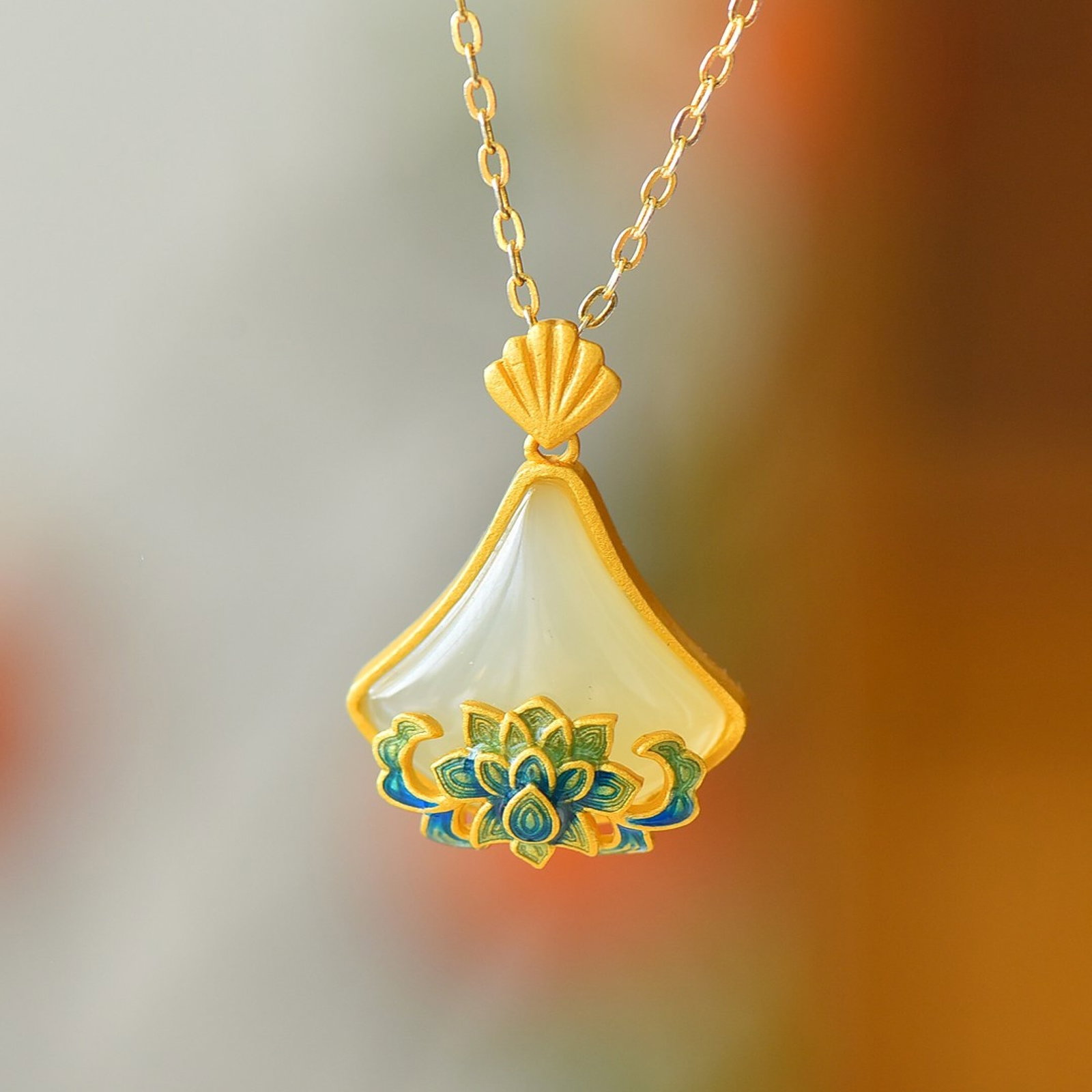 An Exquisite Sterling Silver-Gold Plated Inlaid White Jade Enamel Pendant: An Exquisite Sterling Silver-Gold Plated Inlaid White Jade Enamel Pendant 纯银镀金镶白玉珐琅吊坠