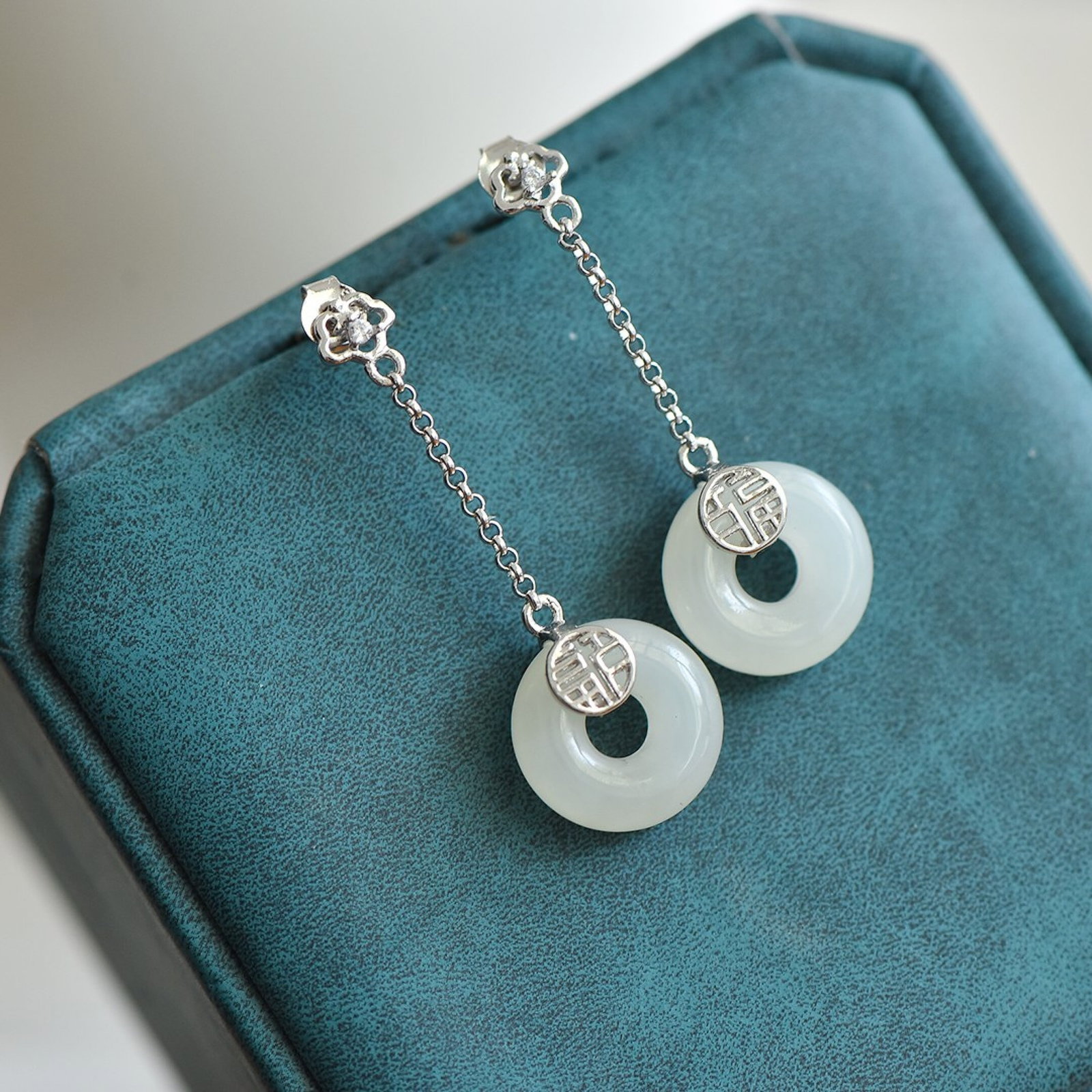 A Pair of Exquisite Sterling Silver Inlaid White Jade Earrings: A Pair of Exquisite Sterling Silver Inlaid White Jade Earrings,Size:13mmx13mm 一对纯银镶白玉耳环