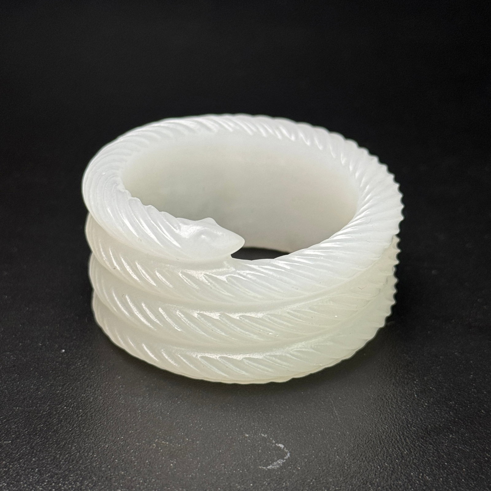 An Exquisite White Jade Snake-Shaped Fingerstall (1 of 7)