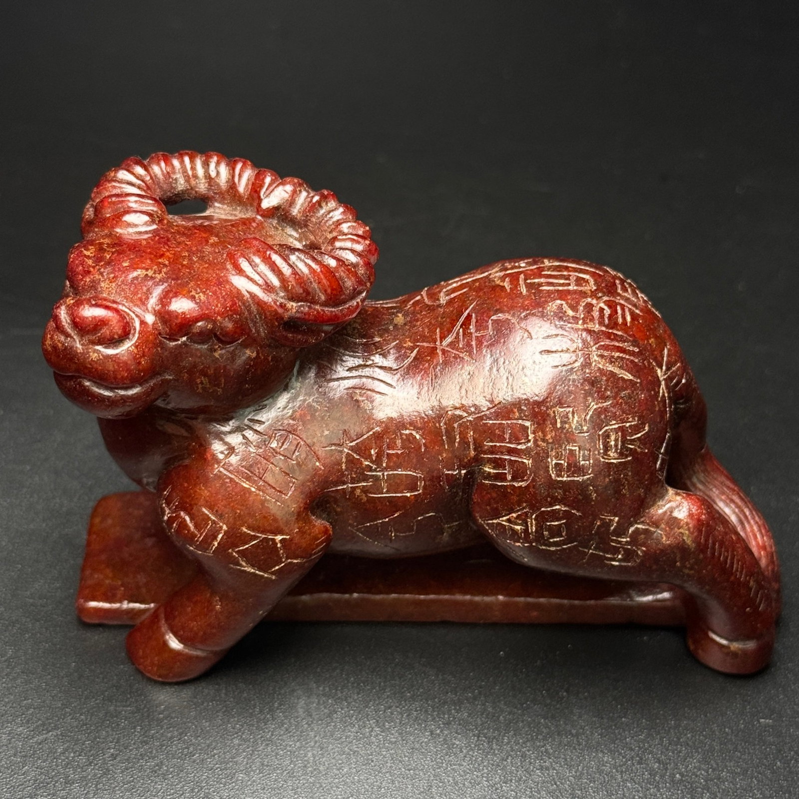 An Exquisite White Jade Buffalo Ornament,With Inscription: An Exquisite White Jade Buffalo Ornament,With Inscription,Qing Dynasty,China,Size:103mmx65mmx45mm,Weight:360g 白玉牛摆件,带铭文,中国清