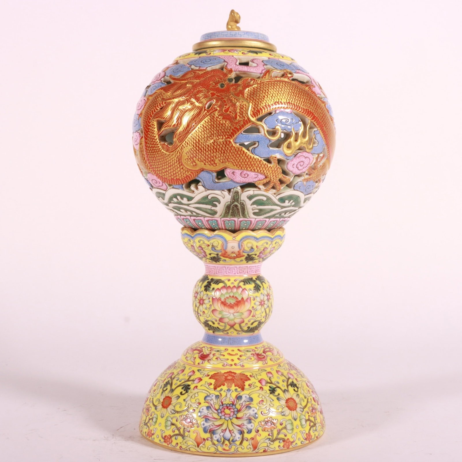 An Exquisite Enamel Yellow Ground Lotus Auspicious Cloud and Dragon Pattern Hatstand: An Exquisite Enamel Yellow Ground Lotus Auspicious Cloud and Dragon Pattern Hatstand,Qing Dynasty, China,Qianlong Four-character Mark,Size:10.6inx5.9in 珐琅彩黄地缠