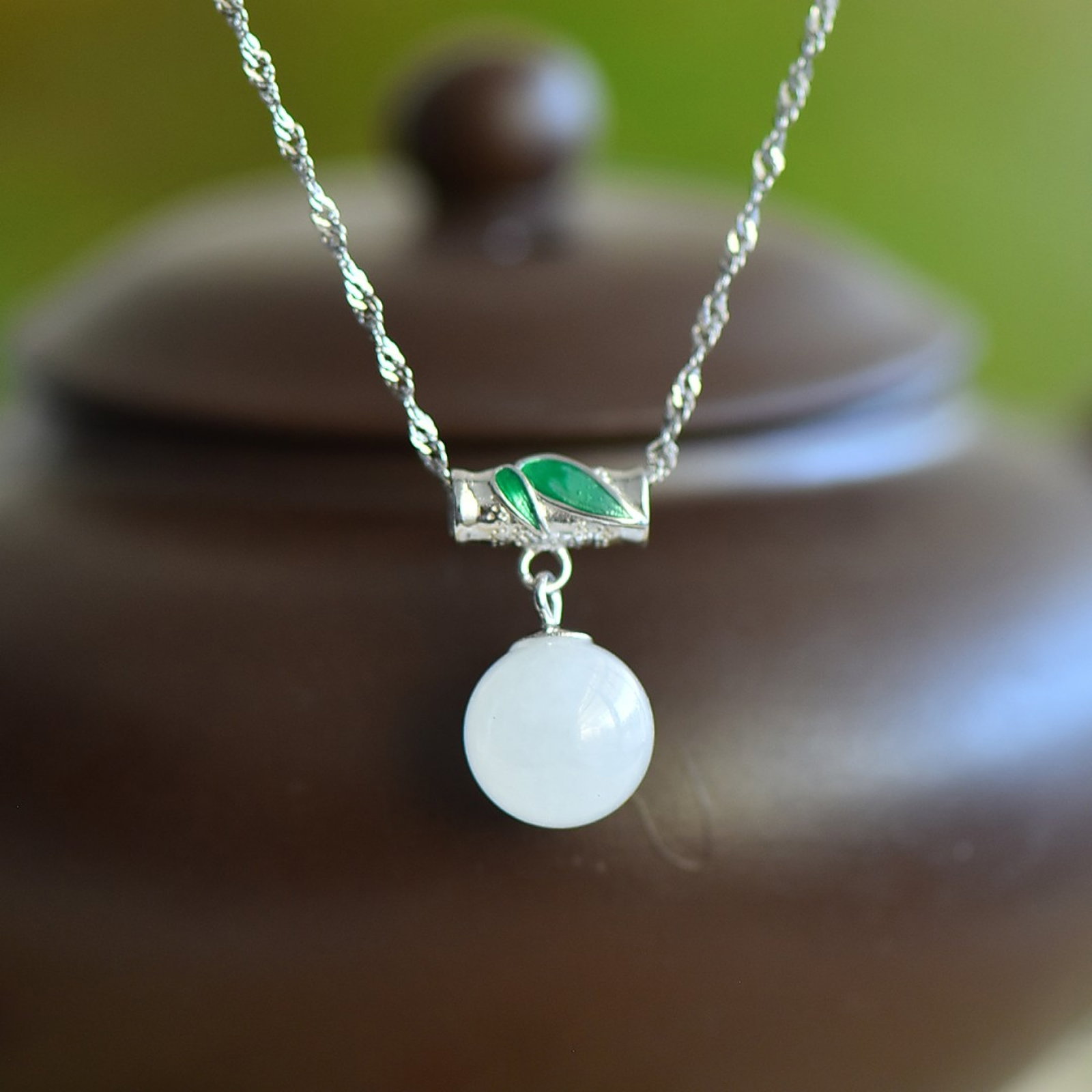 An Exquisite Sterling Silver Inlaid White Jade Pendant: An Exquisite Sterling Silver Inlaid White Jade Pendant 纯银镶白玉吊坠