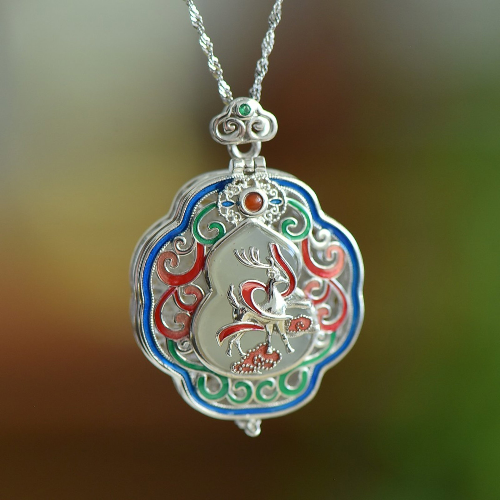 An Exquisite Sterling Silver Inlaid White Jade Pendant: An Exquisite Sterling Silver Inlaid White Jade Pendant 纯银镶白玉吊坠