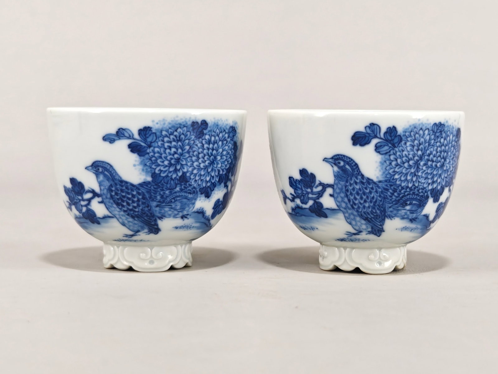 A Pair of Exquisite Blue and White Flower and Bird Pattern Cups: A Pair of Exquisite Blue and White Flower and Bird Pattern Cups,Qing Dynasty,China,Size:2.1inx2.6in 一对青花花鸟纹杯,中国清代