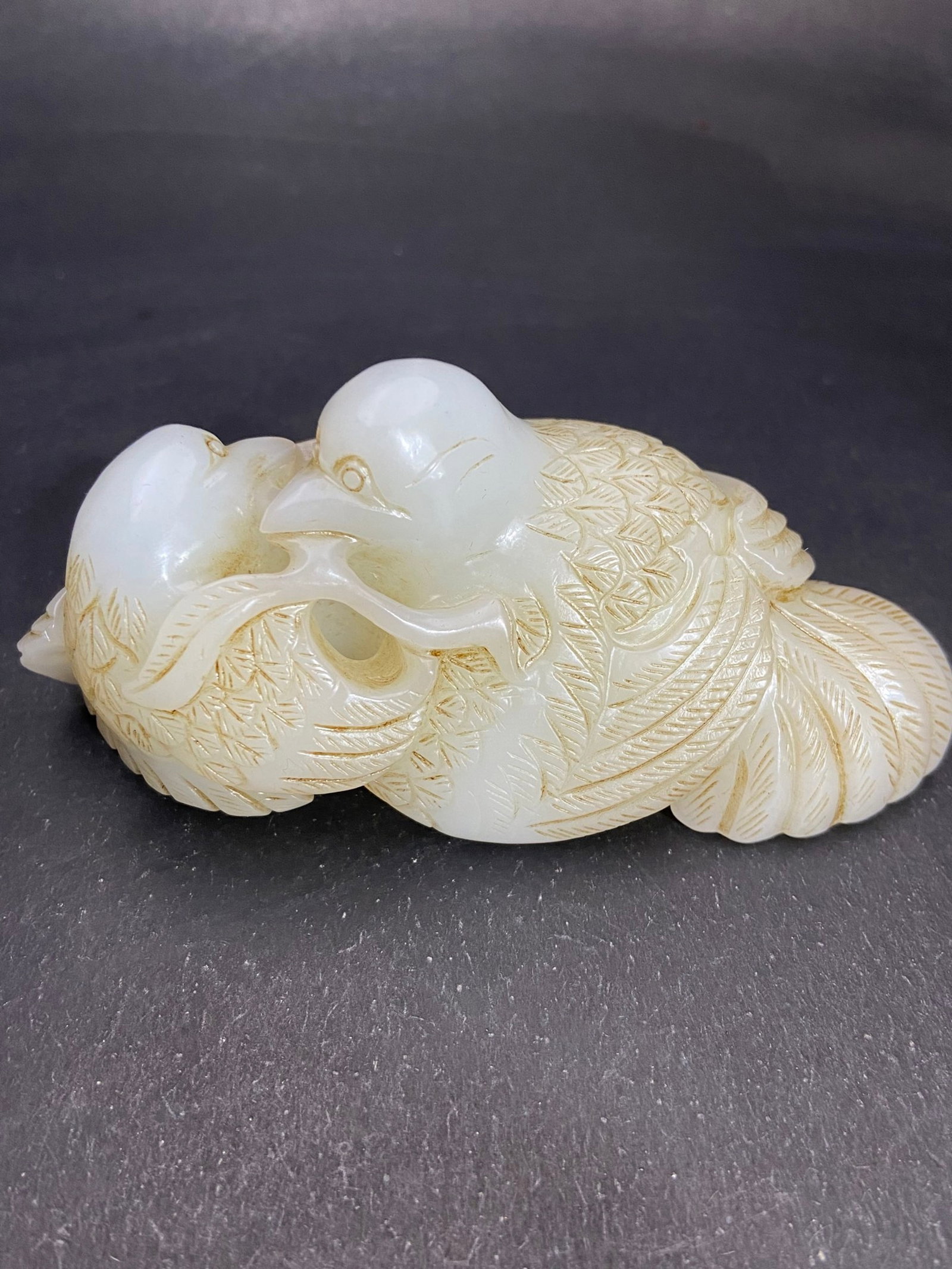 An Exquisite White Jade Bird Hand Piece: An Exquisite White Jade Bird Hand Piece,Qing Dynasty,China,Size:111mmx48.3mmx51mm,Weight:244g 白玉鸟手把件,中国清代