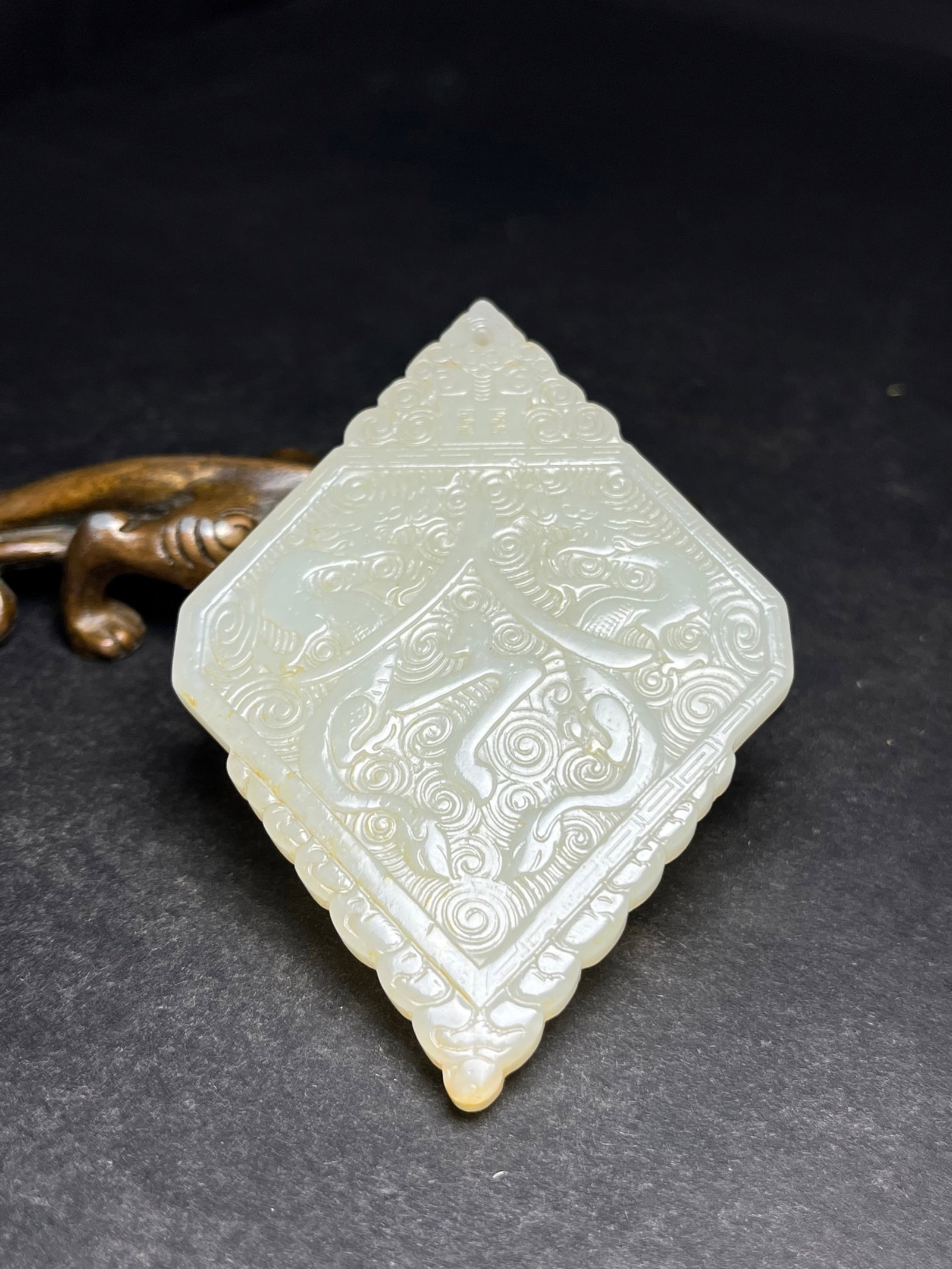 An Exquisite White Jade Dragon Pattern Pendant: An Exquisite White Jade Dragon Pattern Pendant,Qing Dynasty,China,Size:88mmx5mmx60mm,Weight:43g 白玉龙纹挂件,中国清代
