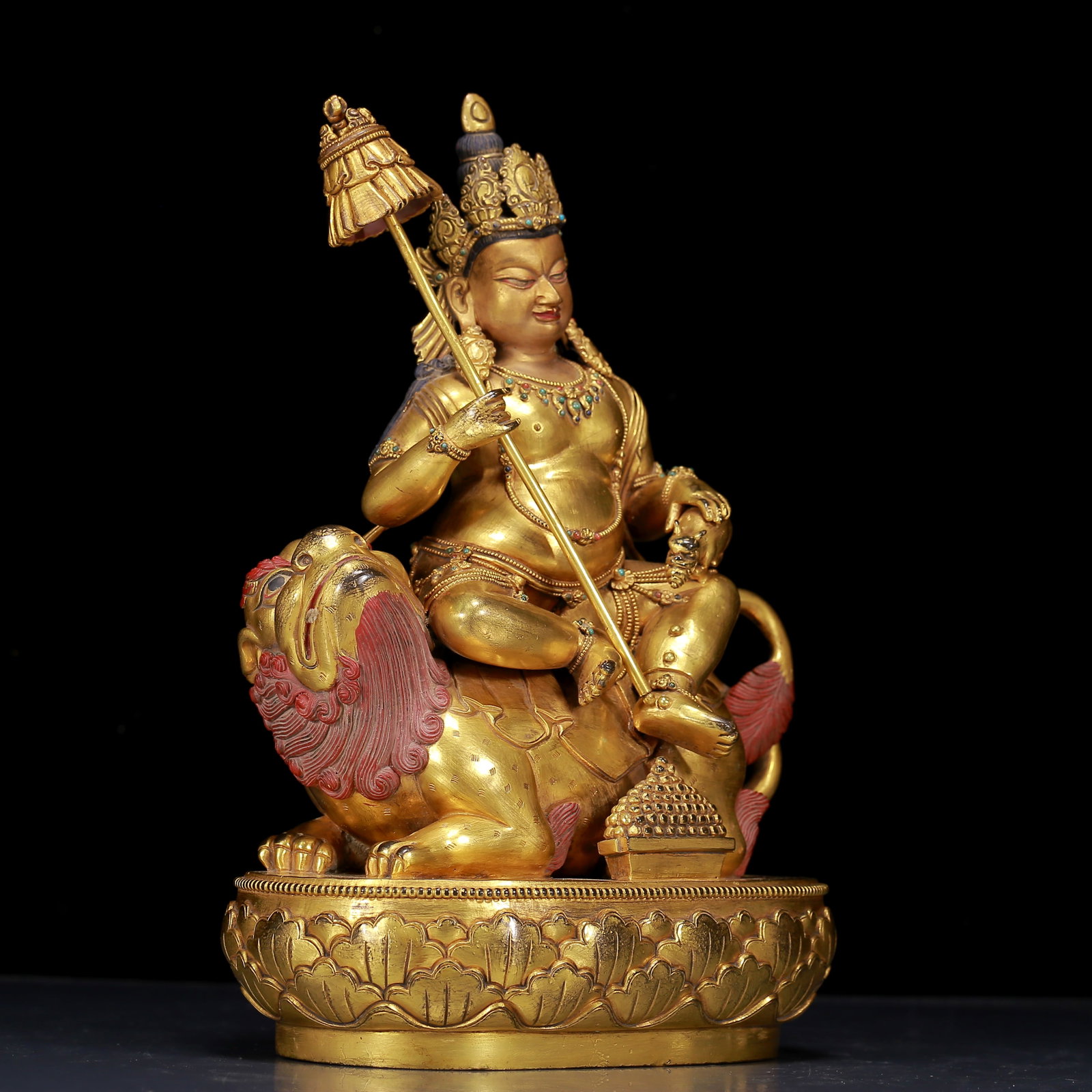 A Rare Gilt Bronze Inlaid Turquoise Statue of Mammon Rides the Lion: A Rare Gilt Bronze Inlaid Turquoise Statue of Mammon Rides the Lion，Ming Dynasty, China，Chenghua Mark，Size: 7.9inx5.9inx12.2in，Weight:7010g 铜鎏金嵌