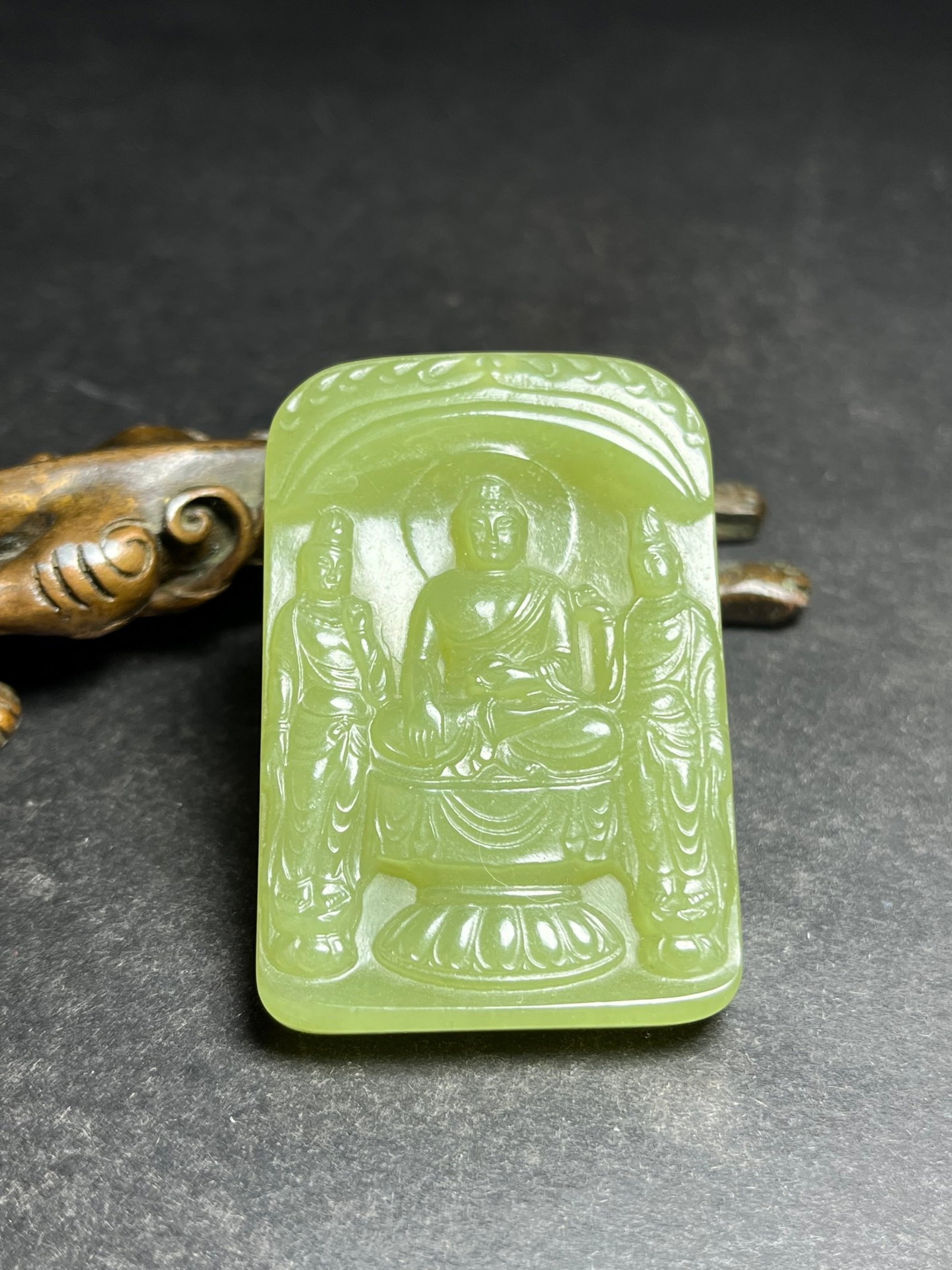 An Exquisite Yellow Jade Buddha Statue Pattern Pendant: An Exquisite Yellow Jade Buddha Statue Pattern Pendant,Qing Dynasty,China,Size:37mmx7mmx56mm,Weight:29g 黄玉佛像纹挂件,中国清代