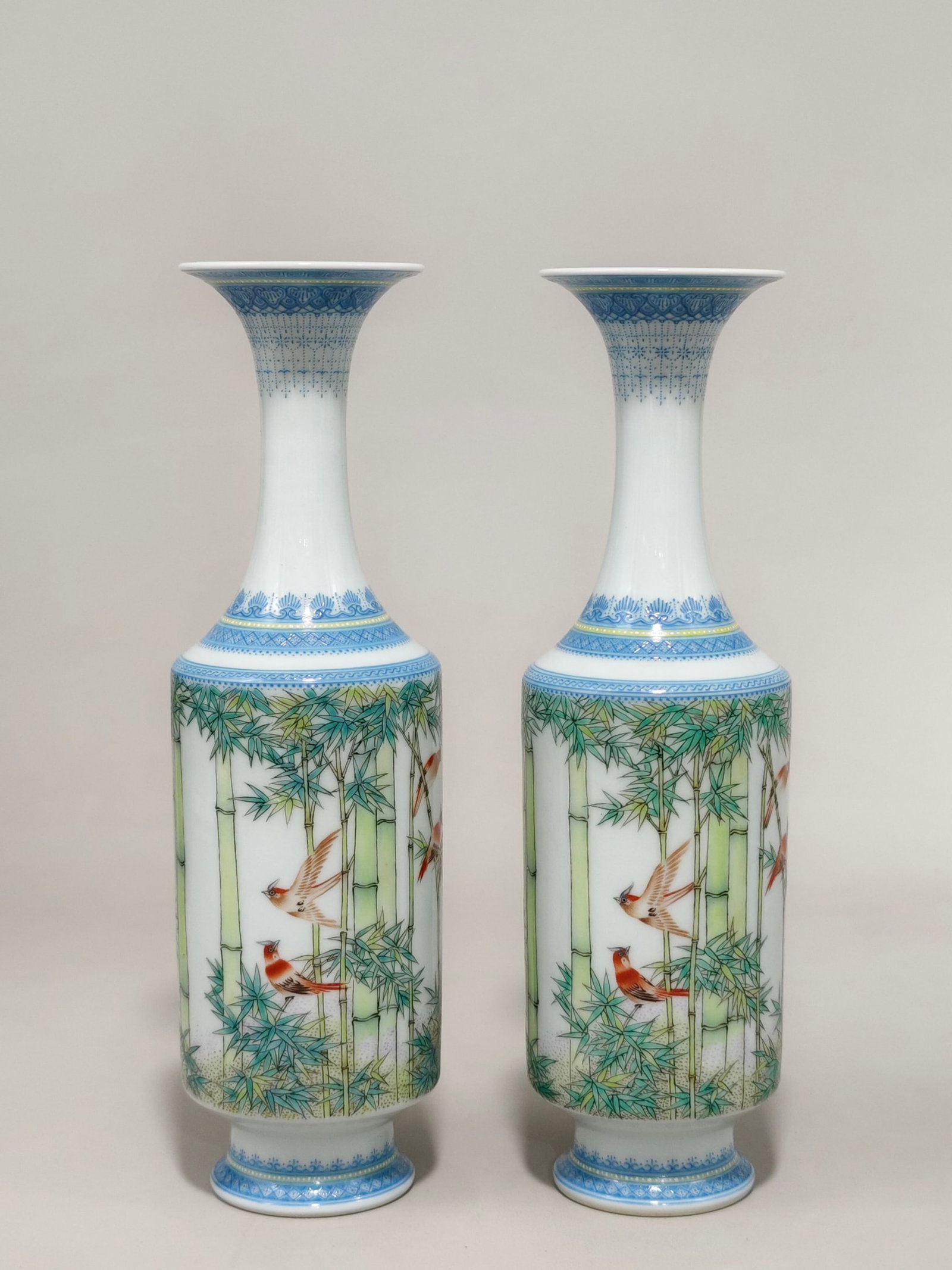 A Pair of Exquisite Famille-Rose Bamboo and Bird Pattern Vases: A Pair of Exquisite Famille-Rose Bamboo and Bird Pattern Vases,Qing Dynasty,China,Yongzheng Four-character Mark,Size:9.1inx2.8in 一对粉彩竹鸟纹瓶,ߑ