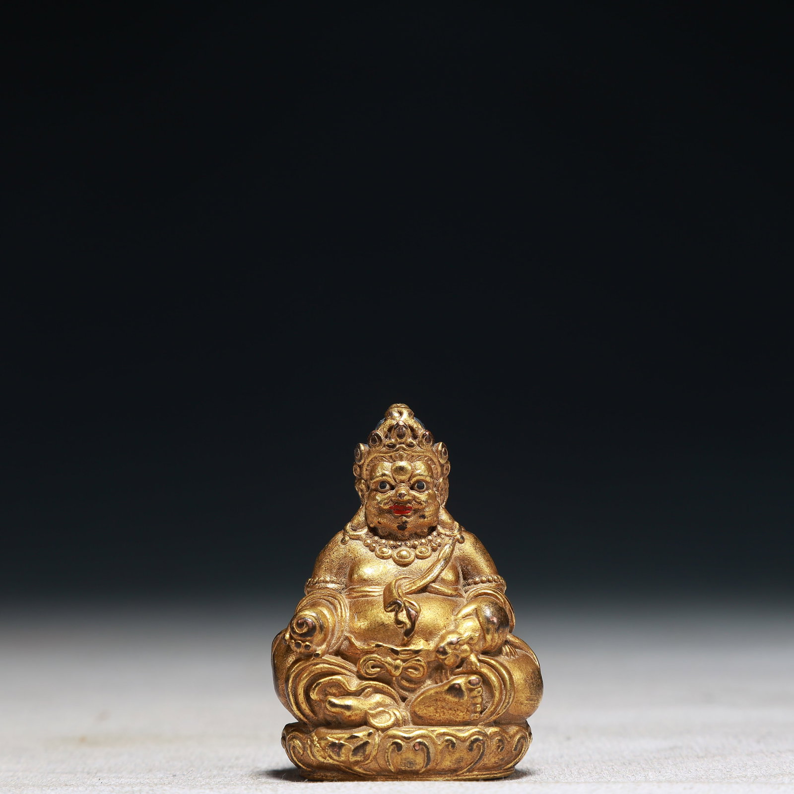 A Solemn Gilt Bronze Statue of Mammon: A Solemn Gilt Bronze Statue of Mammon,Qing Dynasty,China,Size:1.4inx0.8inx2in,Weight:50g 铜鎏金财神像,中国清代