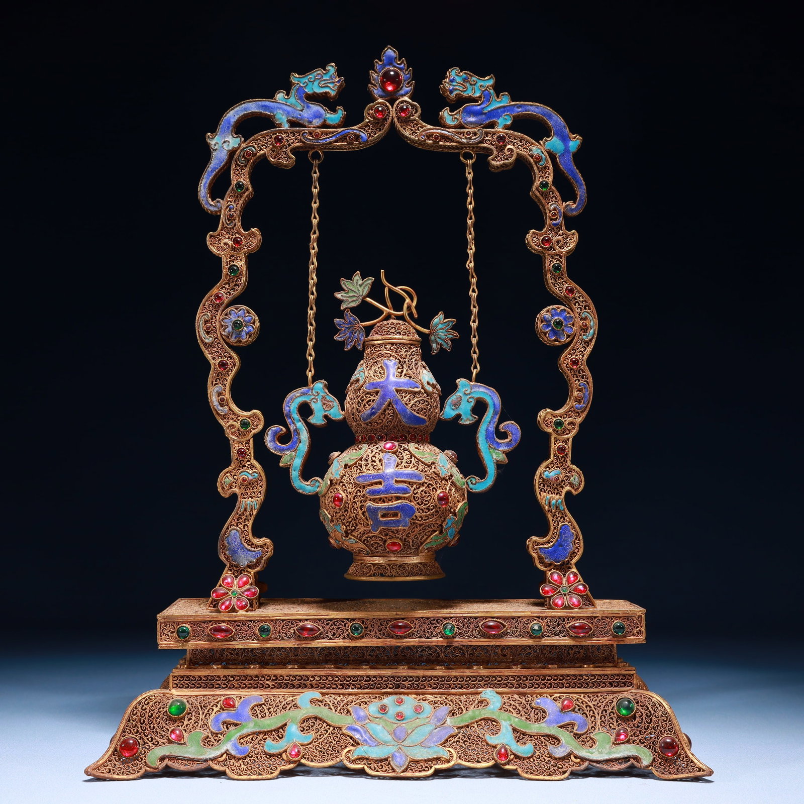 An Exquisite Filigree and Gilding Flower Pattern Double-Ears Gourd-Shaped Vase,Inlaid Gems: An Exquisite Filigree and Gilding Flower Pattern Double-Ears Gourd-Shaped Vase,Inlaid Gems,Qing Dynasty,China,Qianlong Four-character Mark,Size:10.2inx3.9inx13.4in,Weight:1000g 掐丝鎏