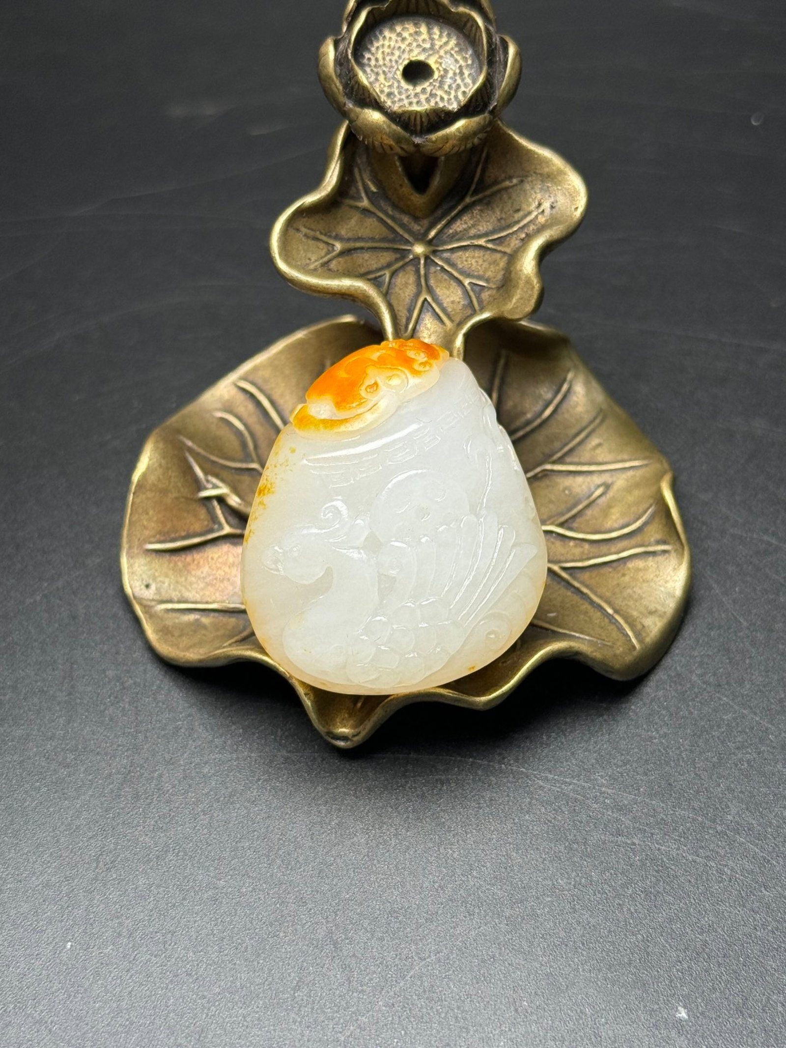 An Exquisite White Jade Phoenix Pattern Pendant: An Exquisite White Jade Phoenix Pattern Pendant,Qing Dynasty,China,Size:34mmx41mmx18mm,Weight:37g 白玉凤纹挂件,中国清代