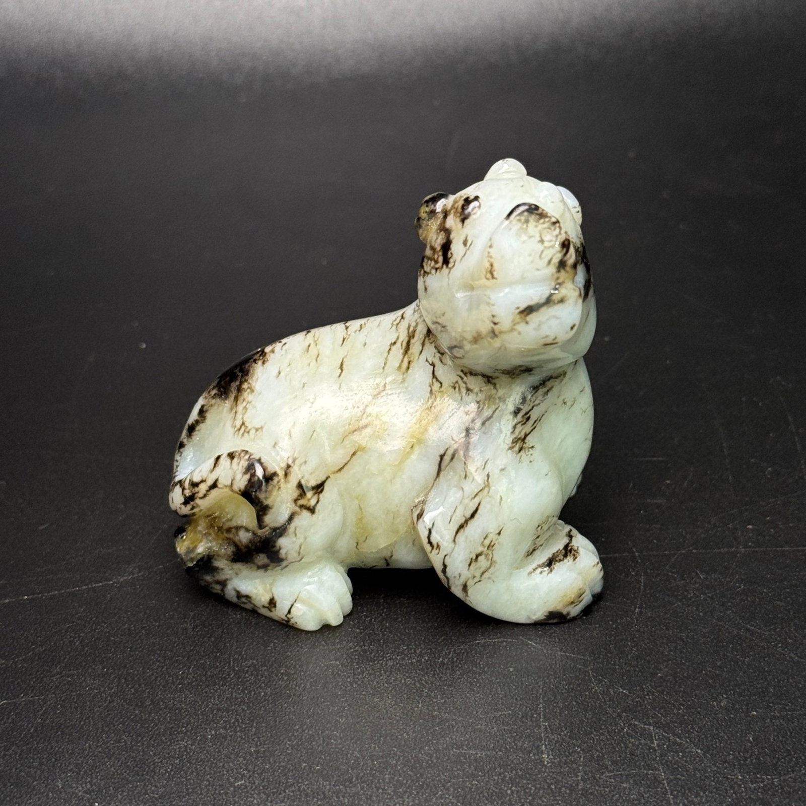 An Exquisite White Jade Auspicious Beast Hand Piece: An Exquisite White Jade Auspicious Beast Hand Piece,Qing Dynasty,China,Size:60mmx61mmx47mm,Weight:206g 白玉瑞兽手把件,中国清代