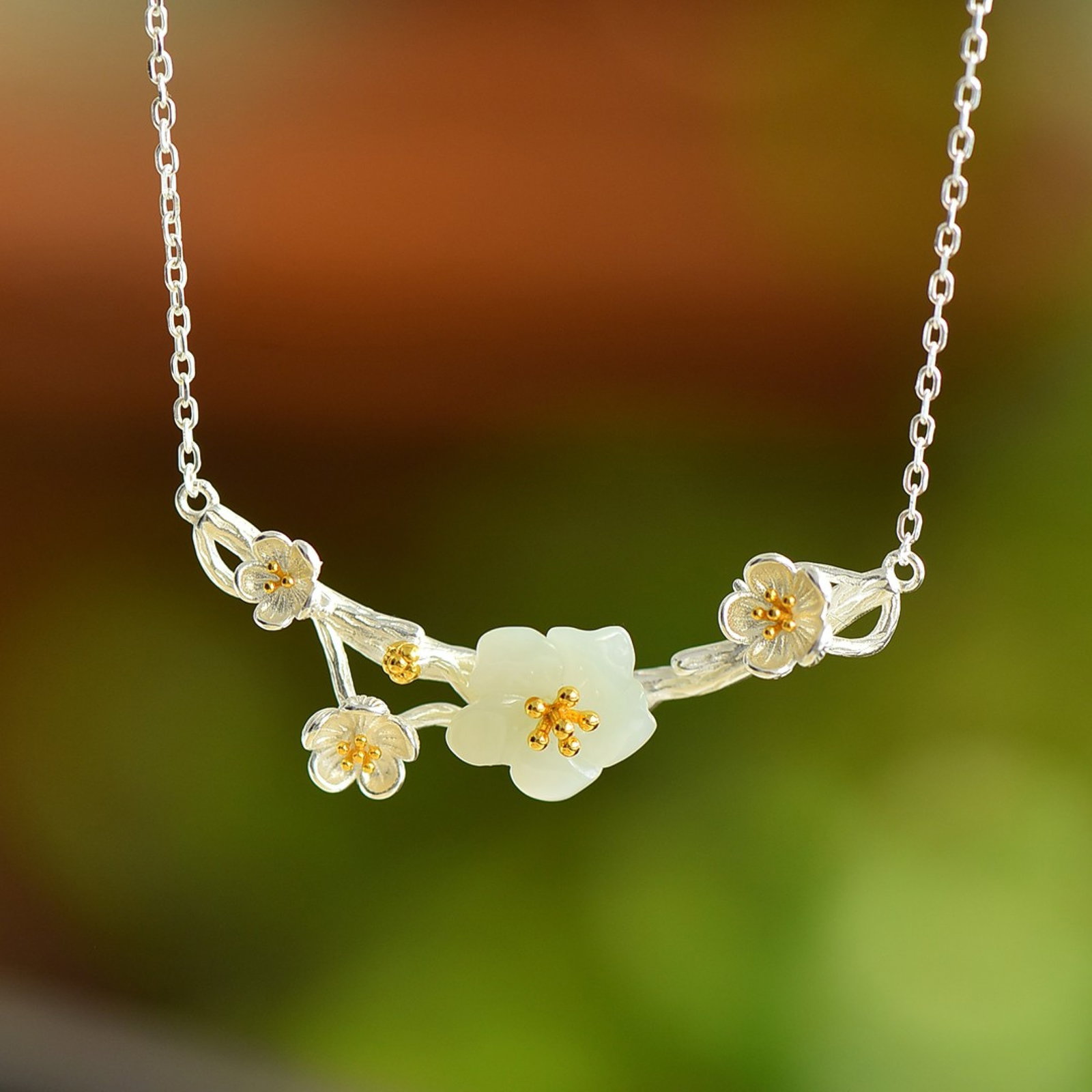 An Exquisite Sterling Silver Inlaid White Jade Pendant: An Exquisite Sterling Silver Inlaid White Jade Pendant 纯银镶白玉吊坠