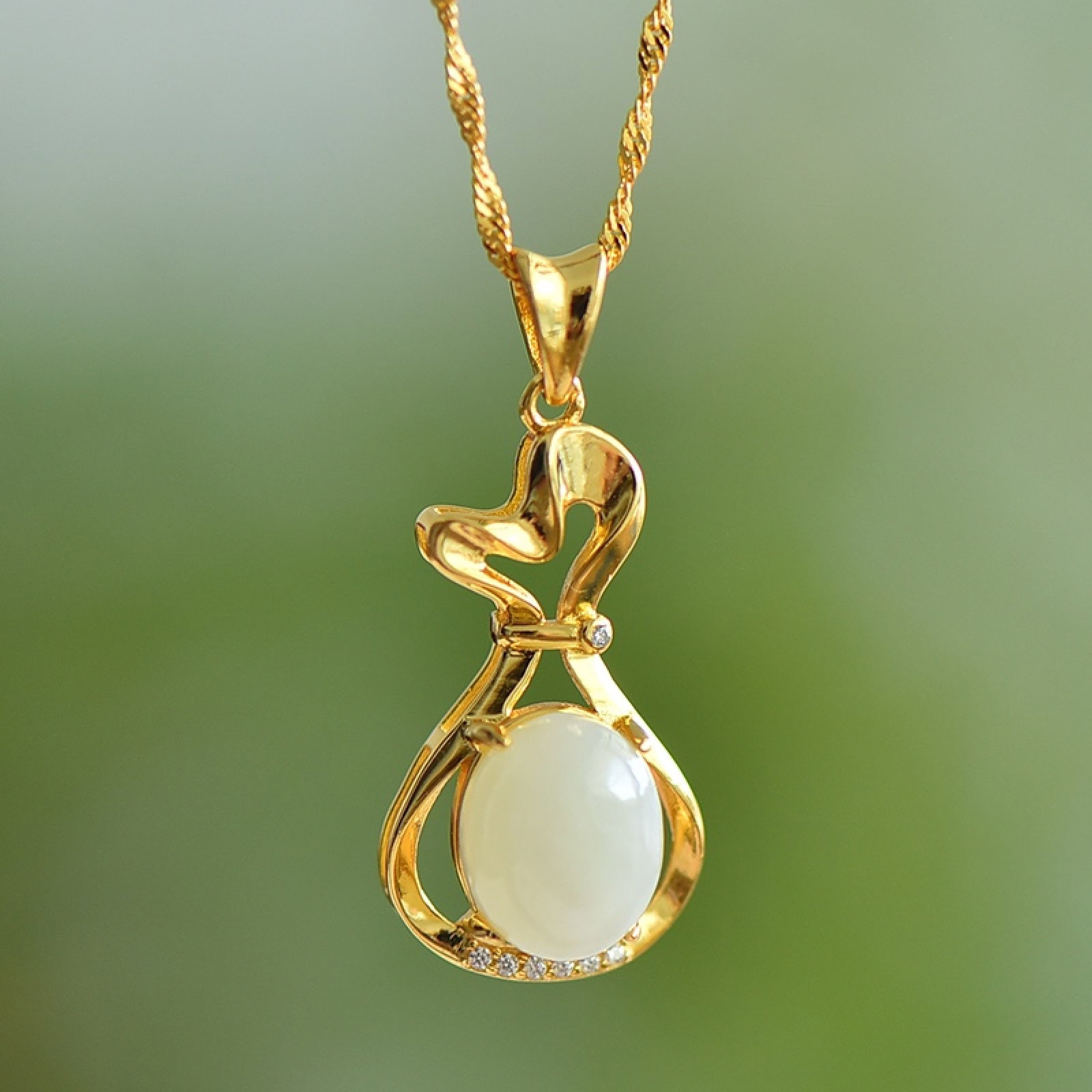 An Exquisite Sterling Silver-Gold Plated Inlaid White Jade Pendant: An Exquisite Sterling Silver-Gold Plated Inlaid White Jade Pendant, 纯银镀金镶白玉吊坠