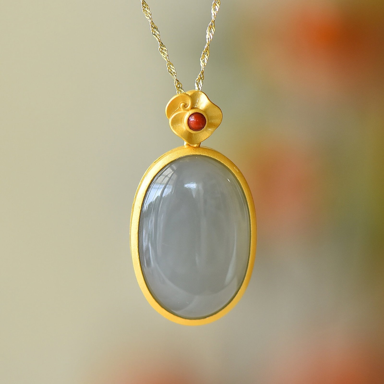 An Exquisite Sterling Silver-Gold Plated Inlaid White Jade Pendant: An Exquisite Sterling Silver-Gold Plated Inlaid White Jade Pendant,Size:20mmx30mm 纯银镀金镶白玉吊坠