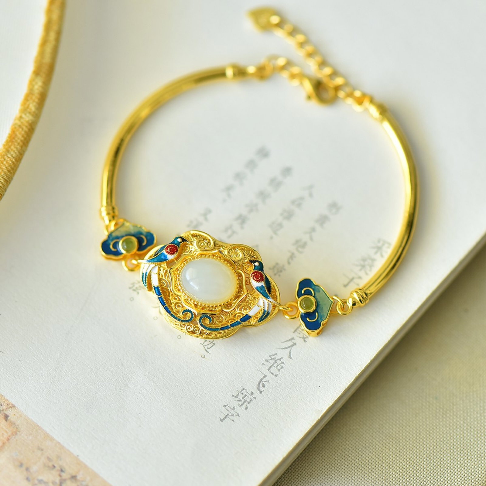 An Exquisite Sterling Silver-Gold Plated Inlaid White Jade Bracelet: An Exquisite Sterling Silver-Gold Plated Inlaid White Jade Bracelet 纯银镀金镶白玉手镯