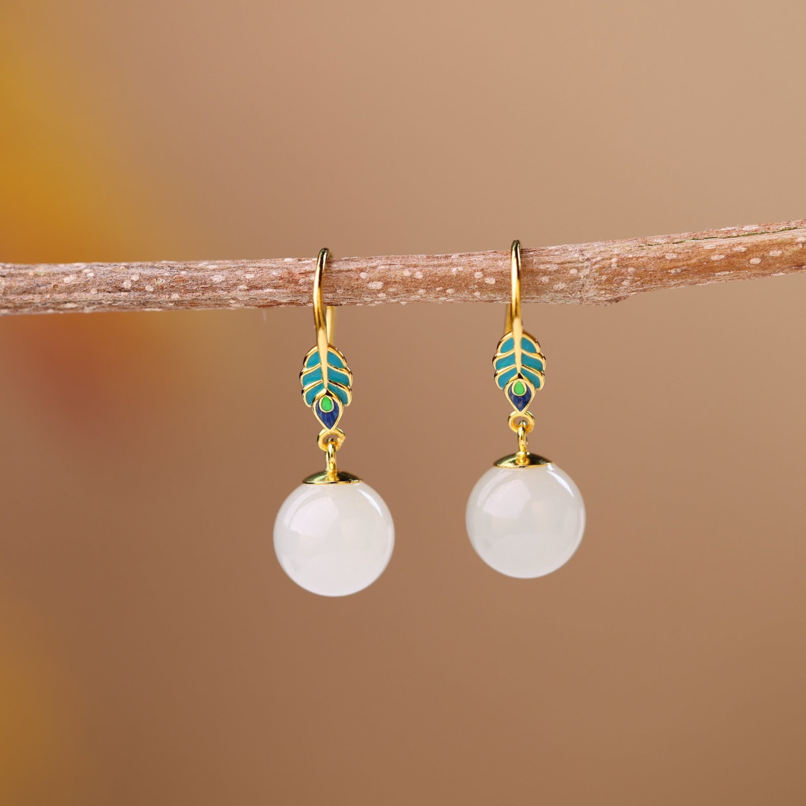 A Pair of Exquisite Sterling Silver-Gold Plated Inlaid White Jade Earrings: A Pair of Exquisite Sterling Silver-Gold Plated Inlaid White Jade Earrings,Size:10mmx10mm 一对纯银镀金镶白玉耳环