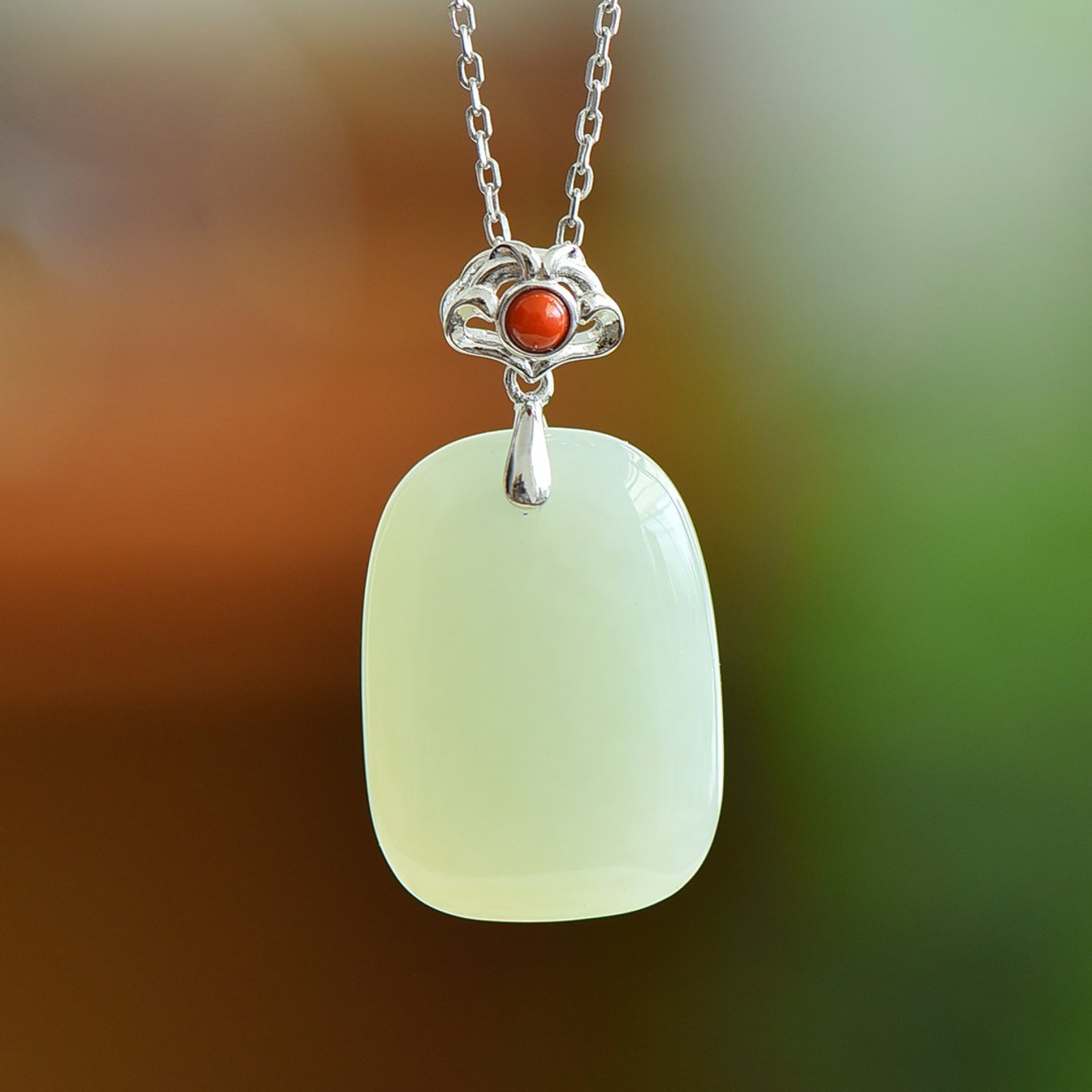 An Exquisite Sterling Silver Inlaid White Jade Pendant: An Exquisite Sterling Silver Inlaid White Jade Pendant,Size:25mmx18mm 纯银镶白玉吊坠