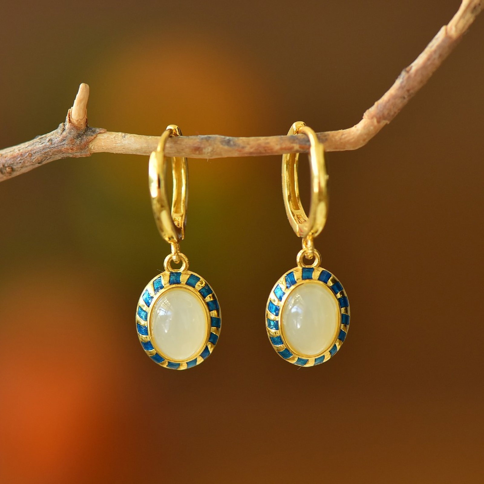 A Pair of Exquisite Sterling Silver-Gold Plated Inlaid White Jade Earrings: A Pair of Exquisite Sterling Silver-Gold Plated Inlaid White Jade Earrings 一对纯银镀金镶白玉耳环