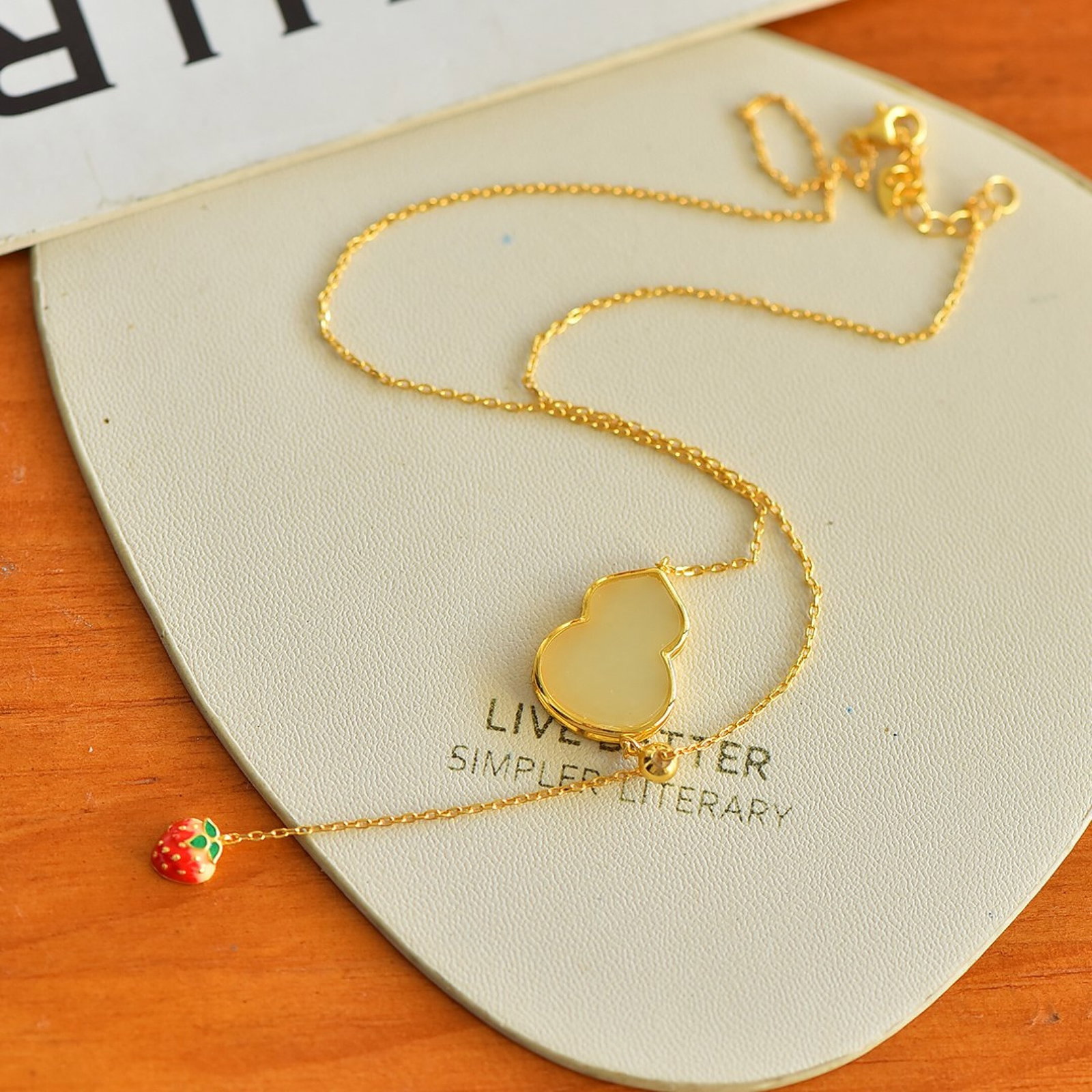 An Exquisite Sterling Silver-Gold Plated Inlaid White Jade Gourd Pendant: An Exquisite Sterling Silver-Gold Plated Inlaid White Jade Gourd Pendant,Size:13mmx17mm 纯银镀金镶白玉葫芦吊坠