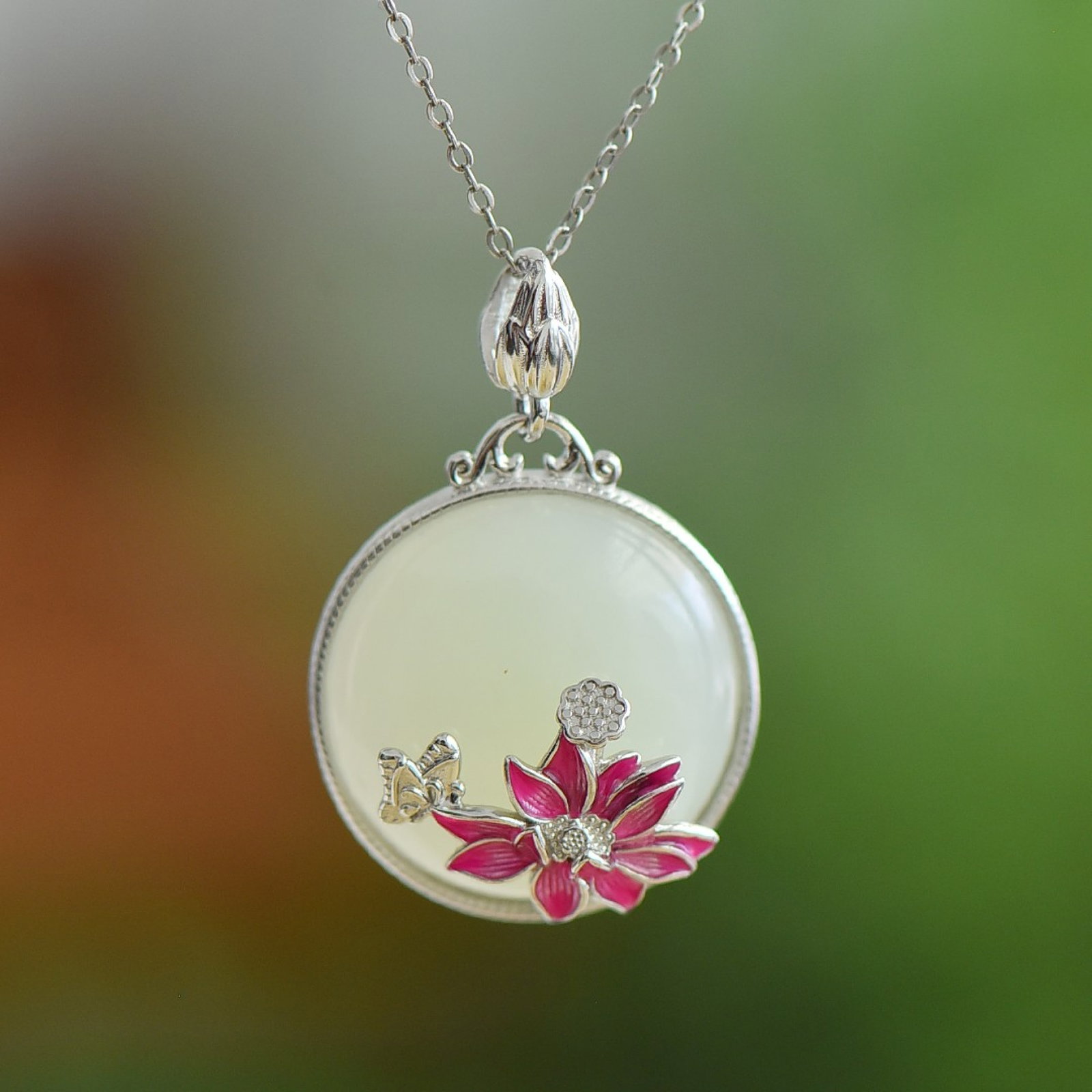 An Exquisite Sterling Silver Inlaid White Jade Pendant: An Exquisite Sterling Silver Inlaid White Jade Pendant 纯银镶白玉吊坠