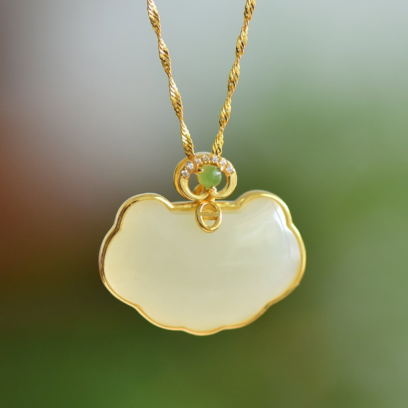 An Exquisite Sterling Silver-Gold Plated Inlaid White Jade Pendant: An Exquisite Sterling Silver-Gold Plated Inlaid White Jade Pendant, 纯银镀金镶白玉吊坠