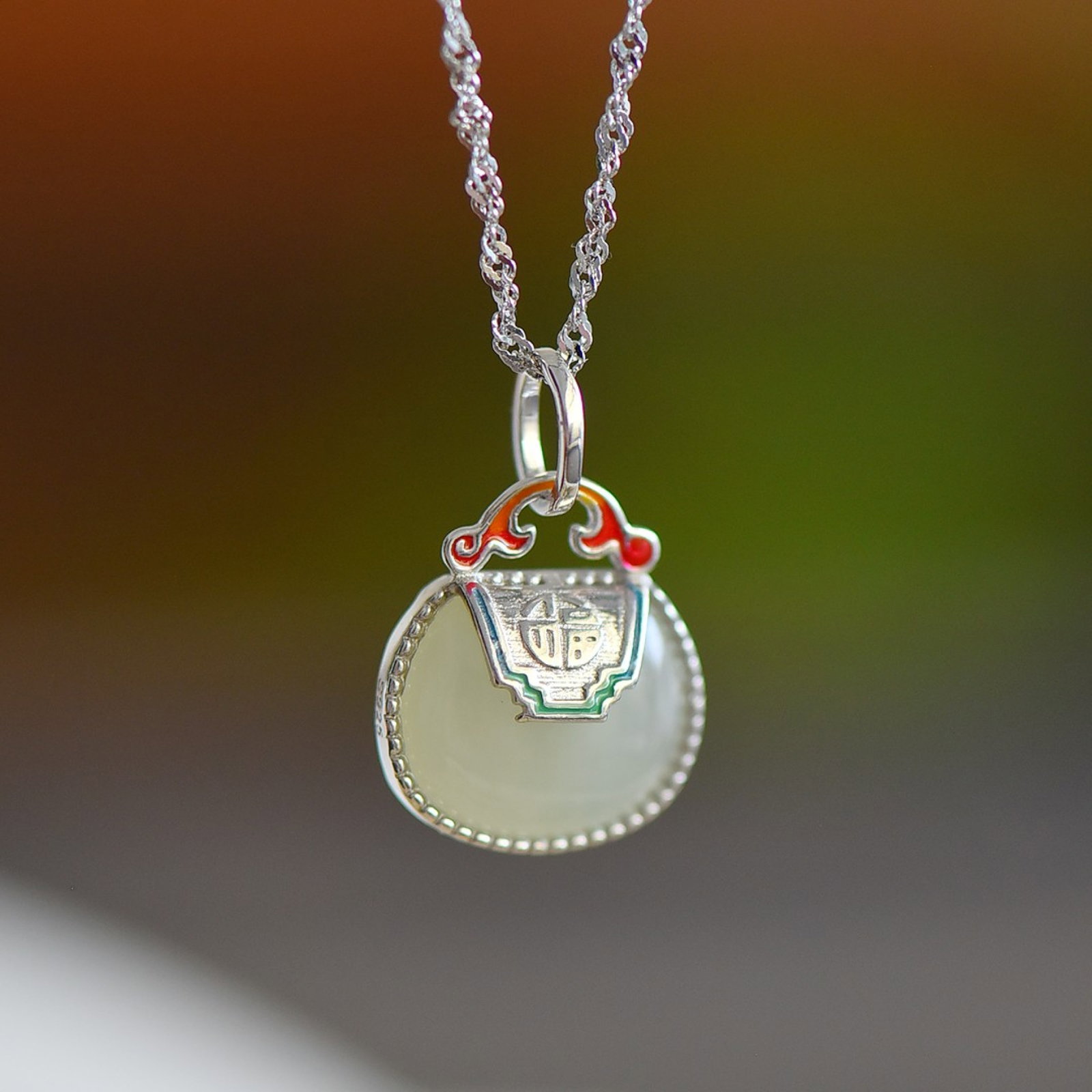 An Exquisite Sterling Silver Inlaid White Jade Pendant: An Exquisite Sterling Silver Inlaid White Jade Pendant 纯银镶白玉吊坠
