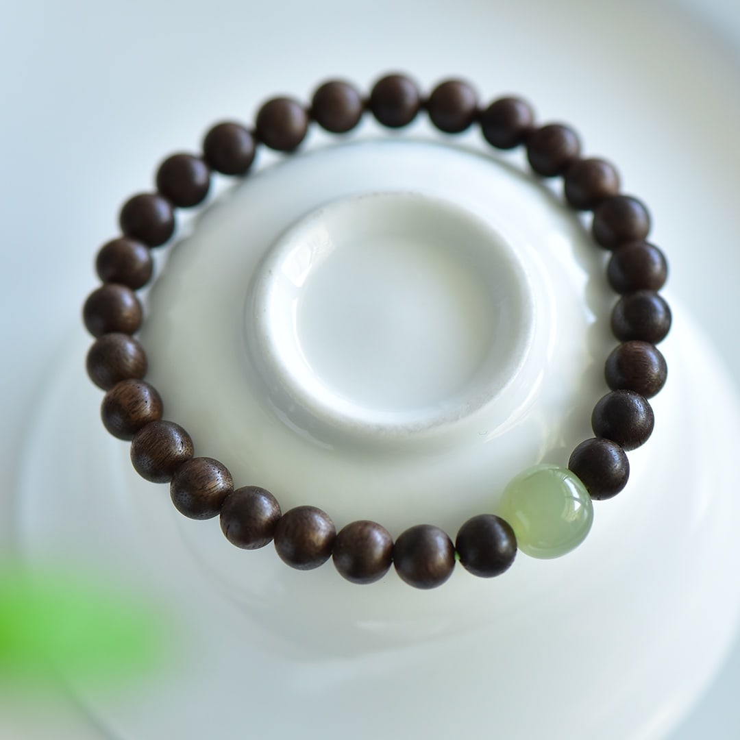 An Exquisite Eaglewood Greenish Jade Bracelets: An Exquisite Eaglewood Greenish Jade Bracelets,Size:7mm 沉香木青白玉手串