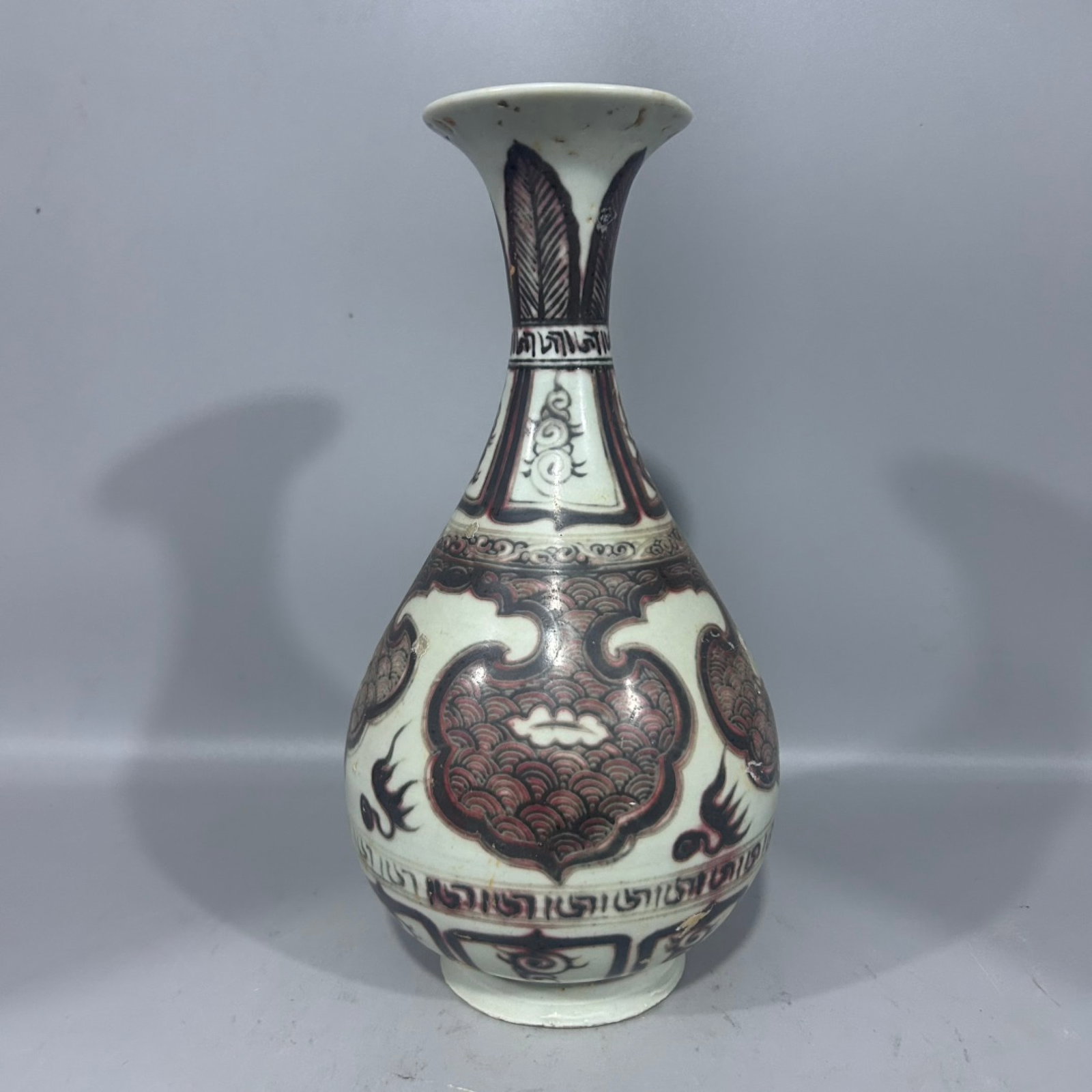 An Exquisite Underglaze-Red Seawater Pattern Vase (1 of 7)