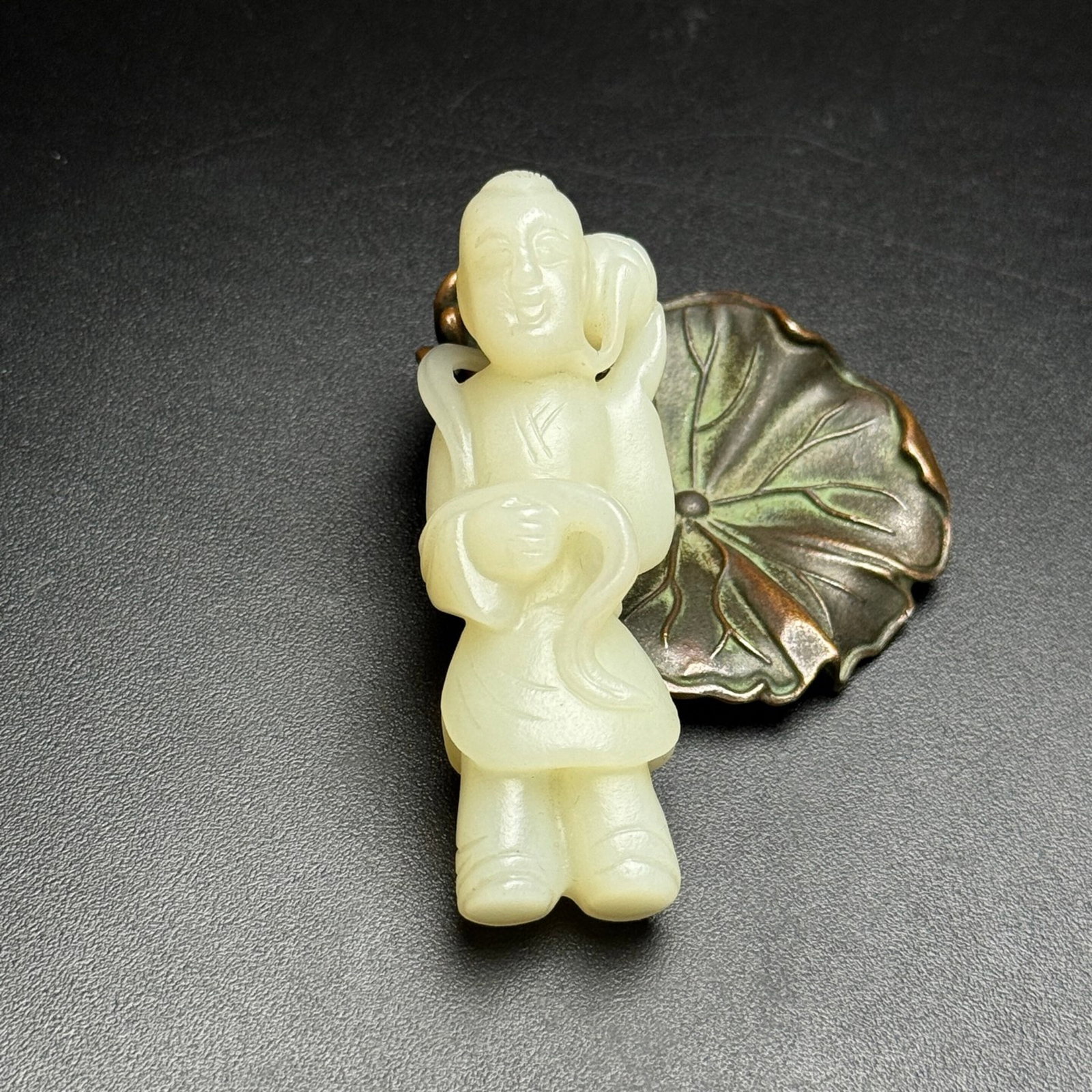 An Exquisite White Jade Figure Hand Piece: An Exquisite White Jade Figure Hand Piece,Qing Dynasty,China,Size:69mmx23mmx21mm,Weight:42g 白玉人物手把件,中国清代