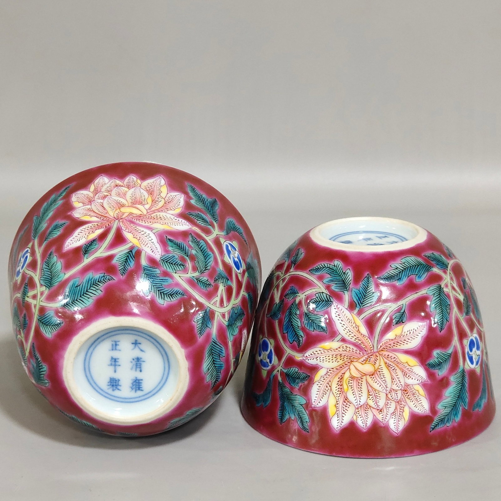 A Pair of Exquisite Red Ground Famille-Rose Flower Pattern Cups: A Pair of Exquisite Red Ground Famille-Rose Flower Pattern Cups,Qing Dynasty,China,Yongzheng Six-character Mark,Size:2.3inx3.1in 一对红地粉彩花卉纹