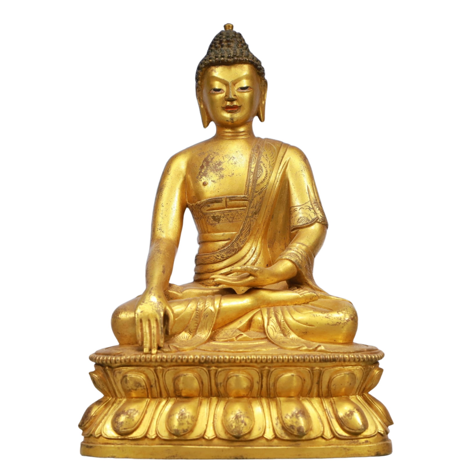 A Solemn Gilt Bronze Statue of Sakyamuni: A Solemn Gilt Bronze Statue of Sakyamuni,Qing Dynasty, China,Size:5.5inx3.9inx8.3in,Weight:2150g 铜鎏金释迦摩尼像,中国清代