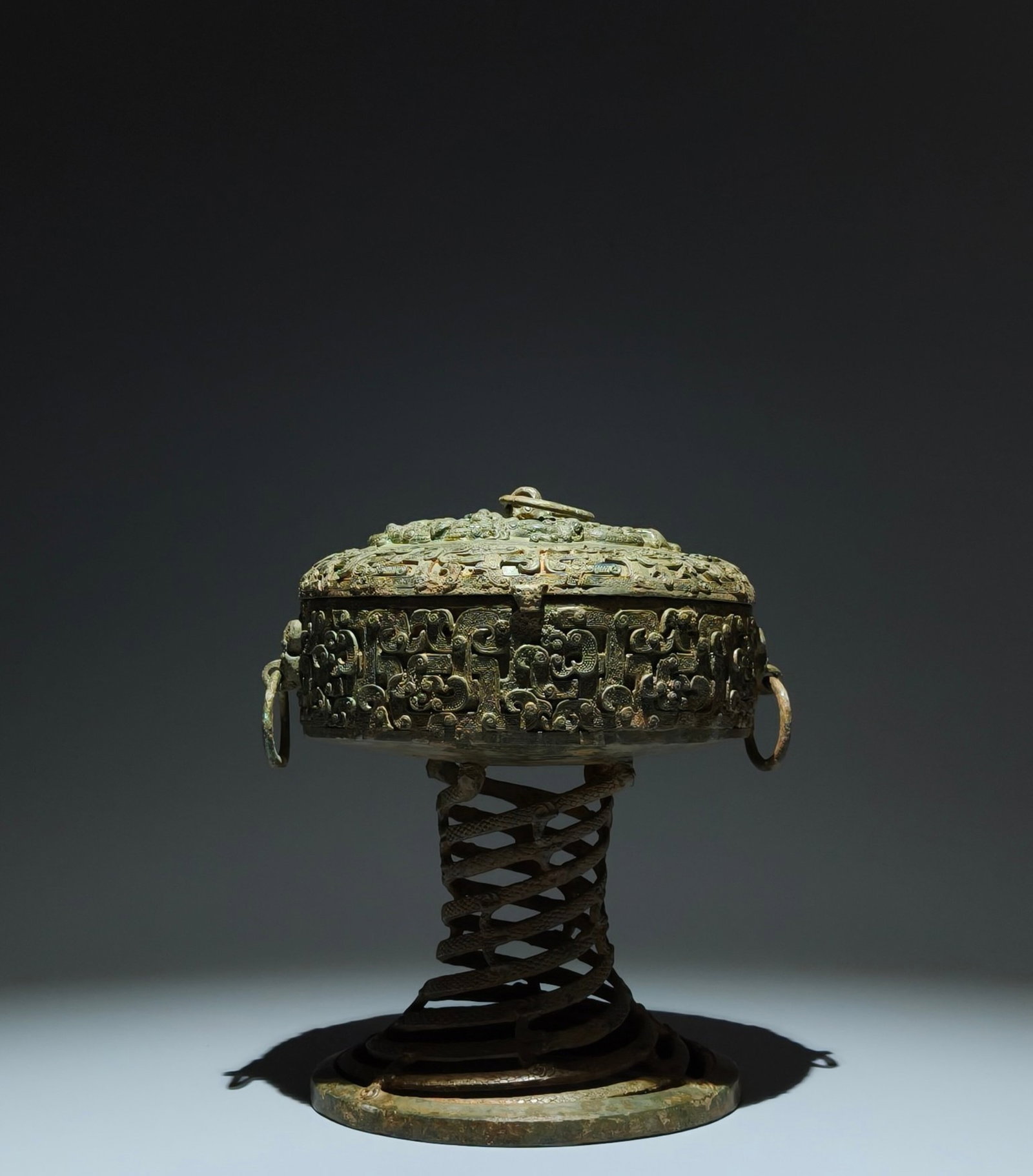 An Archaic Bronze Interlaced Chi-Dragon Pattern Hollow Beast-Ears Food Vessel,With Inscription: An Archaic Bronze Interlaced Chi-Dragon Pattern Hollow Beast-Ears Food Vessel,With Inscription,the Warring States period in China,Size:9.8inx7.5in 青铜蟠螭纹镂Ĺ