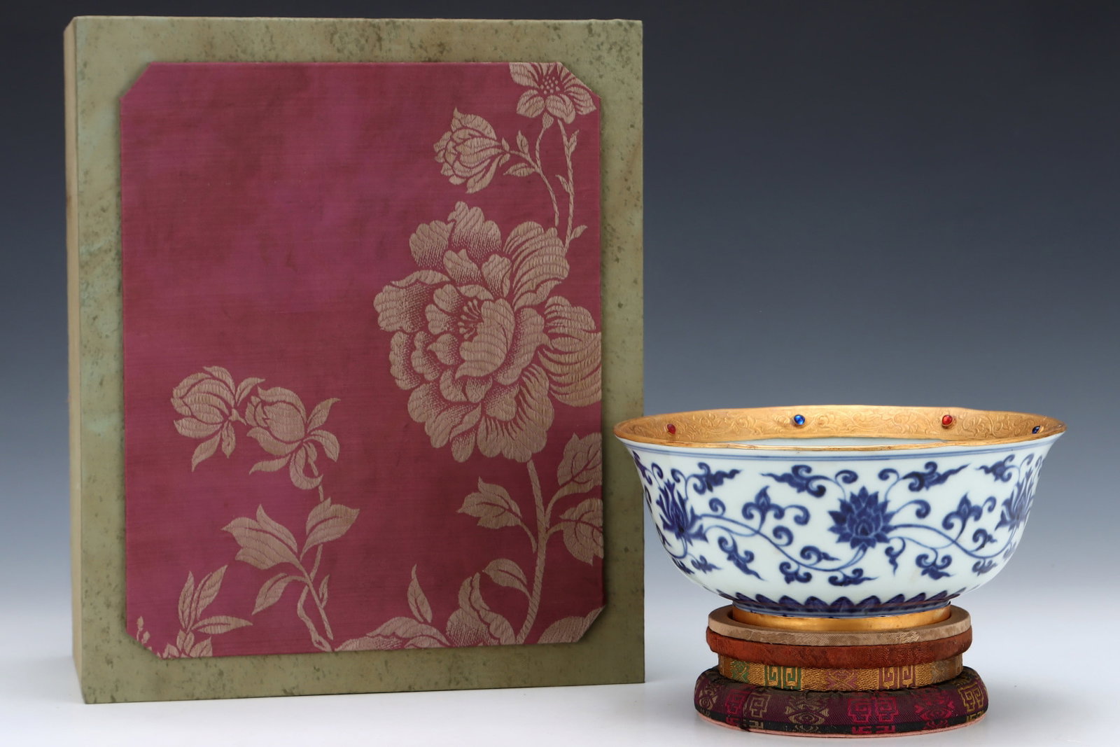 An Exquisite Blue and White Cover with Gold Lotus Pattern Bowl,Inlaid Gems: An Exquisite Blue and White Cover with Gold Lotus Pattern Bowl,Inlaid Gems,Ming Dynasty,China,Xuande Six-character Mark,Size:3.6inx7.9in 青花包金缠枝莲纹