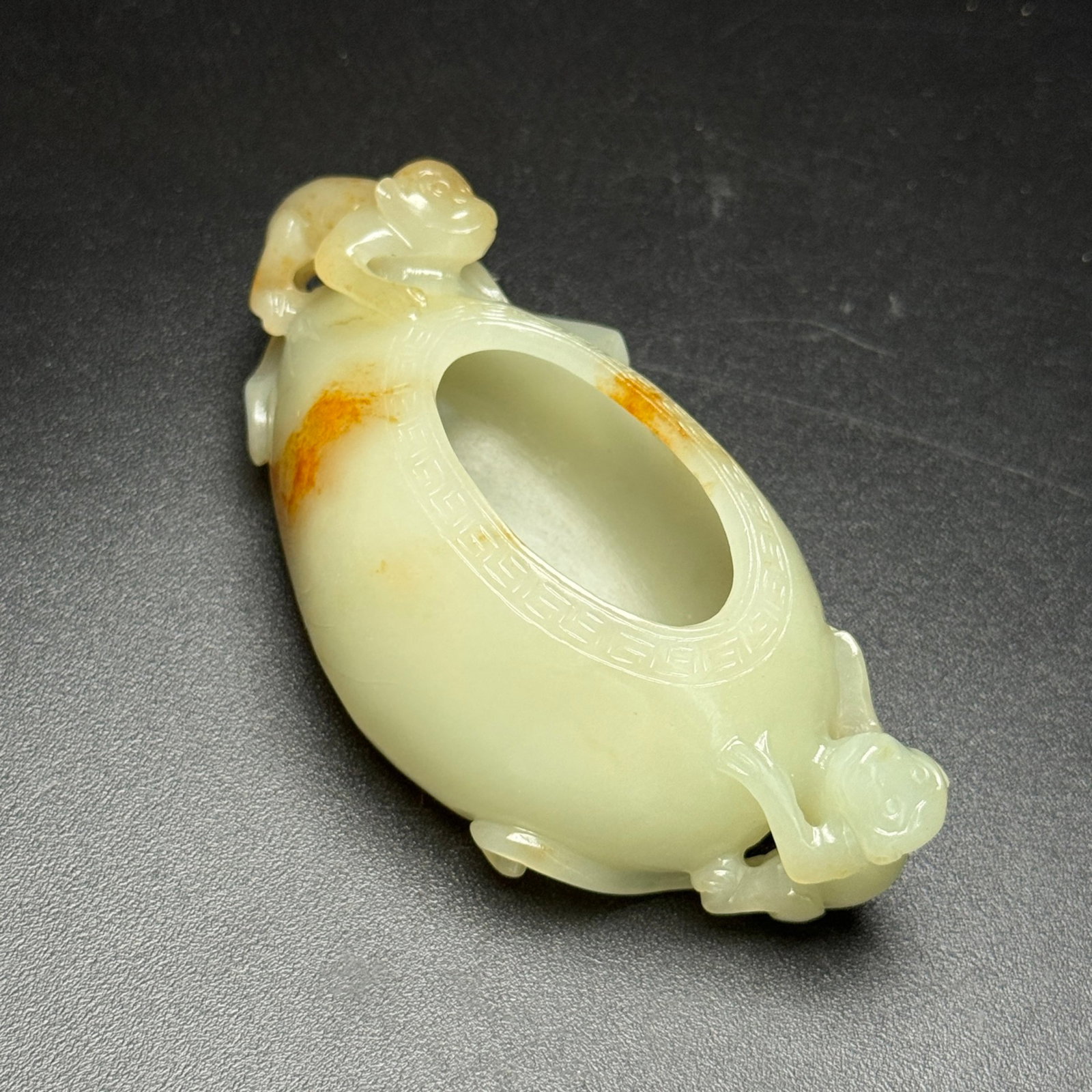 An Exquisite White Jade Monkey Pattern Brush Washer: An Exquisite White Jade Monkey Pattern Brush Washer,Qing Dynasty,China,Size:98mmx44mmx33mm,Weight:112g 白玉猴纹笔洗,中国清代