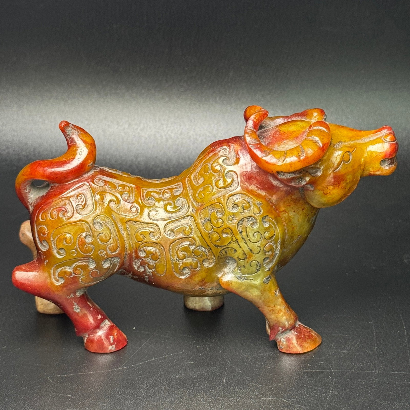 An Exquisite White Jade Buffalo Ornament: An Exquisite White Jade Buffalo Ornament,Qing Dynasty,China,Size:145mmx82mmx54mm,Weight:550g 白玉牛摆件,中国清代