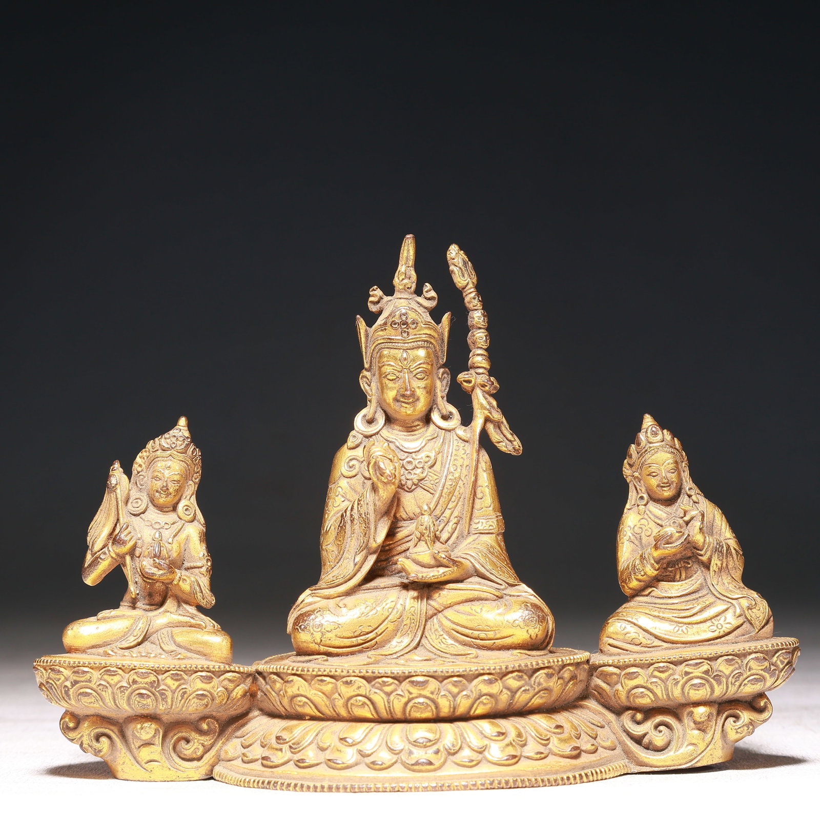 A Solemn Gilt Bronze Statue of Padma Sambhava: A Solemn Gilt Bronze Statue of Padma Sambhava,Qing Dynasty,China,Size:5.9inx2.6inx4.5in,Weight:700g 铜鎏金莲花生大士像,中国清