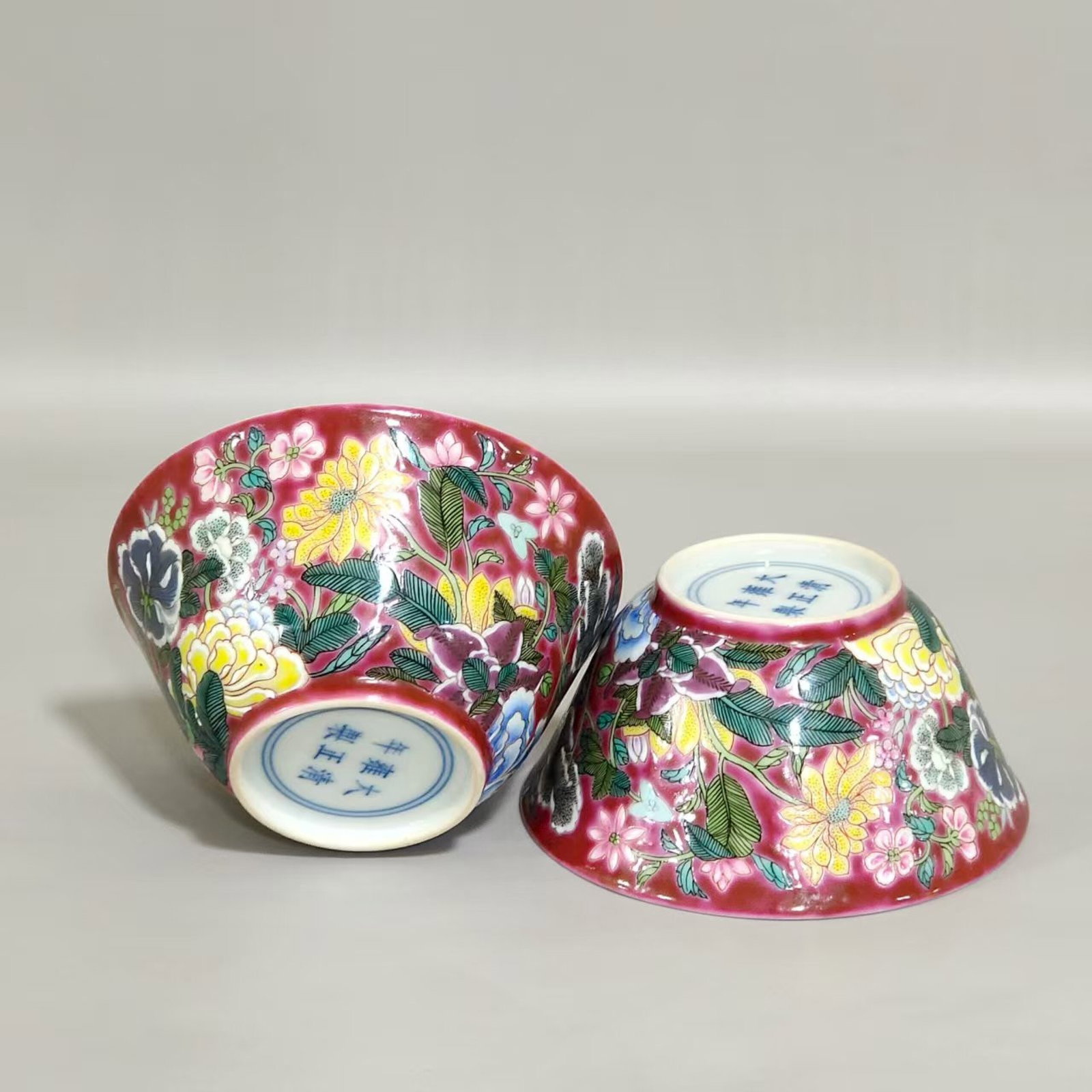 A Pair of Exquisite Ruby Red-Ground Famille-Rose Flower Pattern Cups: A Pair of Exquisite Ruby Red-Ground Famille-Rose Flower Pattern Cups,Qing Dynasty,China,Yongzheng Six-character Mark,Size:1.7inx3.6in 一对胭脂红地粉彩&#