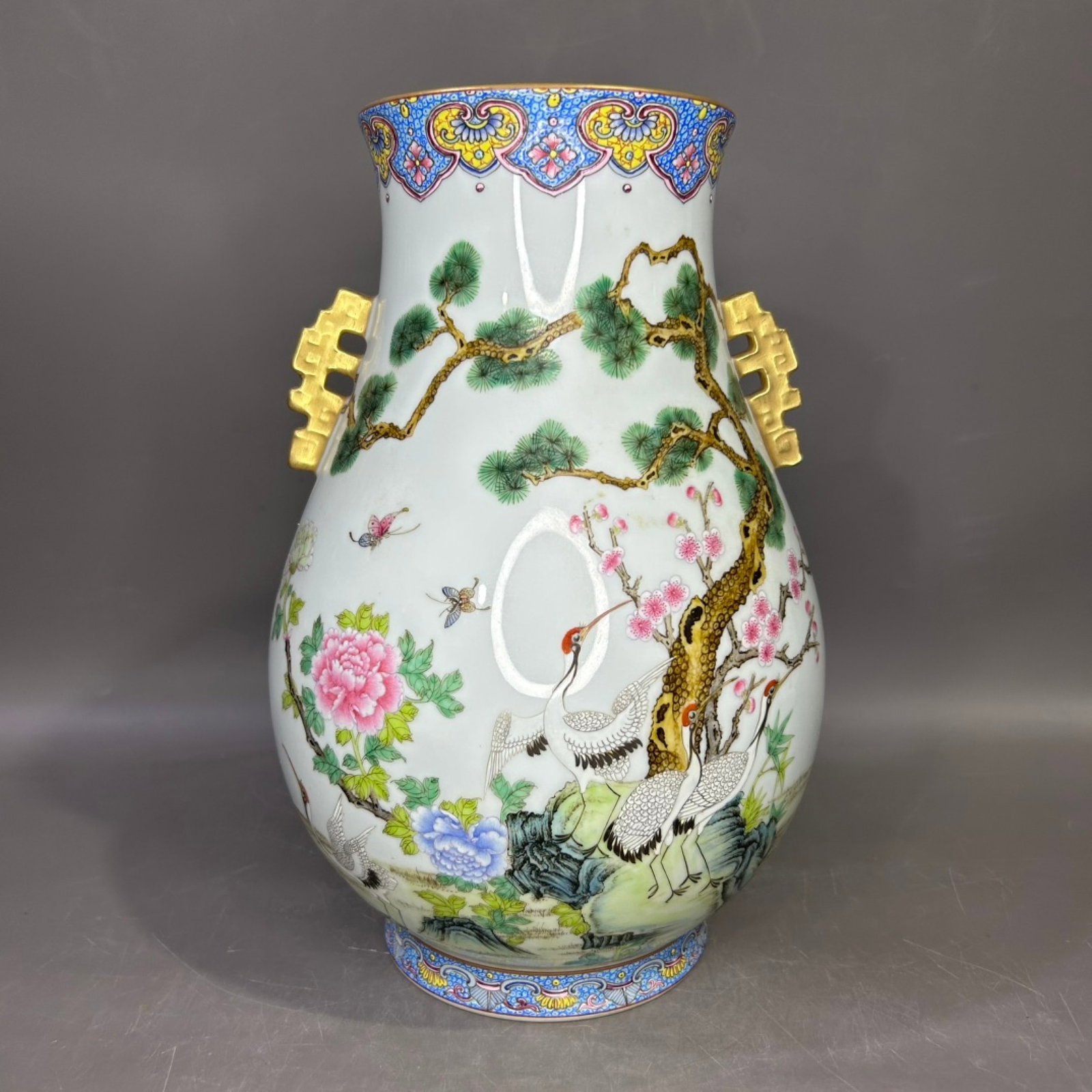 An Exquisite Famille-Rose Painted Gold Pine and Crane Pattern Double-Ears Vase,With Poem: An Exquisite Famille-Rose Painted Gold Pine and Crane Pattern Double-Ears Vase,With Poem,Qing Dynasty,China,Qianlong Six-character Mark,Size:6.7in 粉彩描金松鹤ń
