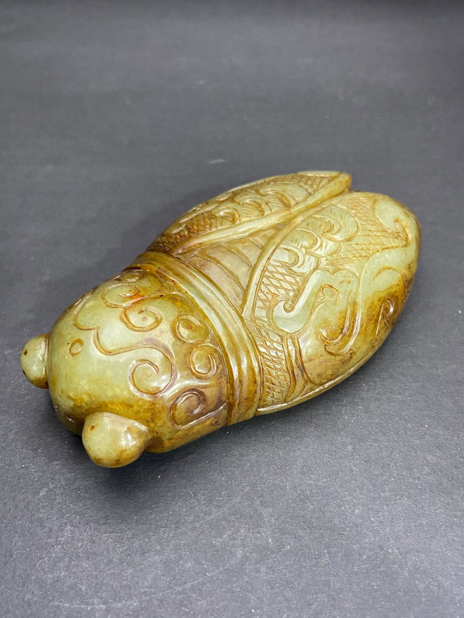 An Exquisite White Jade Cicada Pendant: An Exquisite White Jade Cicada Pendant,Qing Dynasty,China,Size:97mmx57mmx26.5mm,Weight:234g 白玉蝉挂件,中国清代