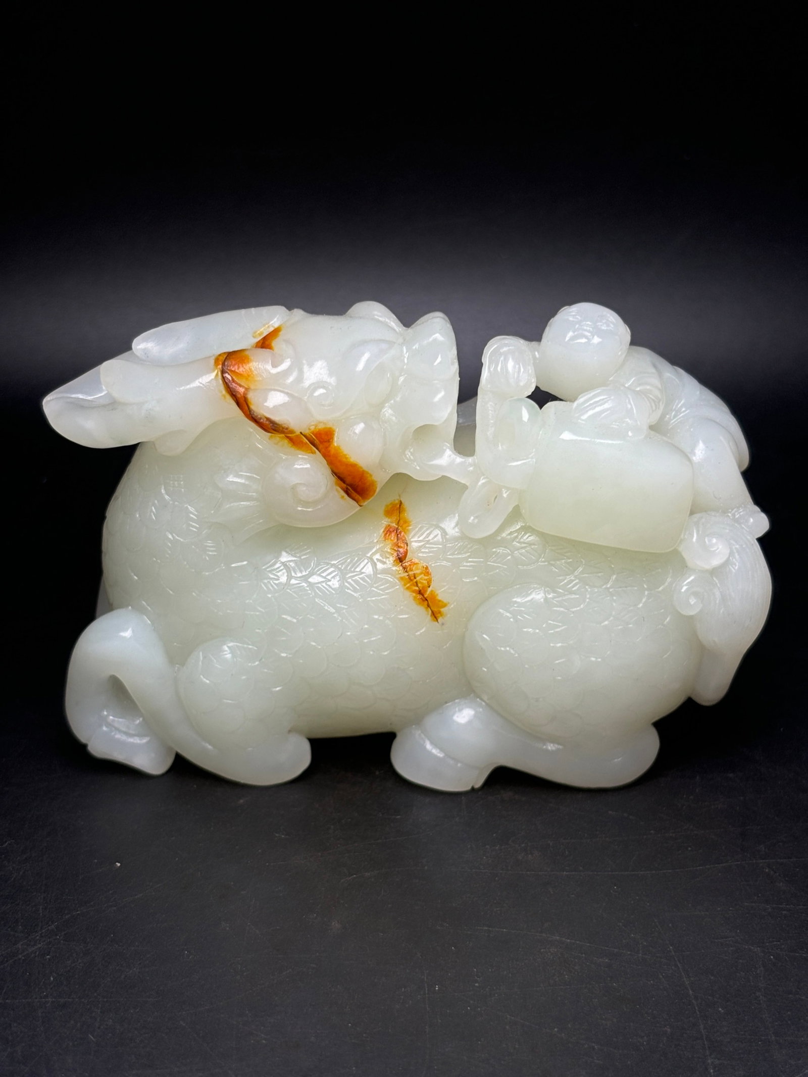 An Exquisite White Jade Figure Pattern Kylin Ornament: An Exquisite White Jade Figure Pattern Kylin Ornament,Qing Dynasty,China,Size:98mmx64mmx43mm,Weight:393g 白玉人物纹麒麟摆件,中国଀