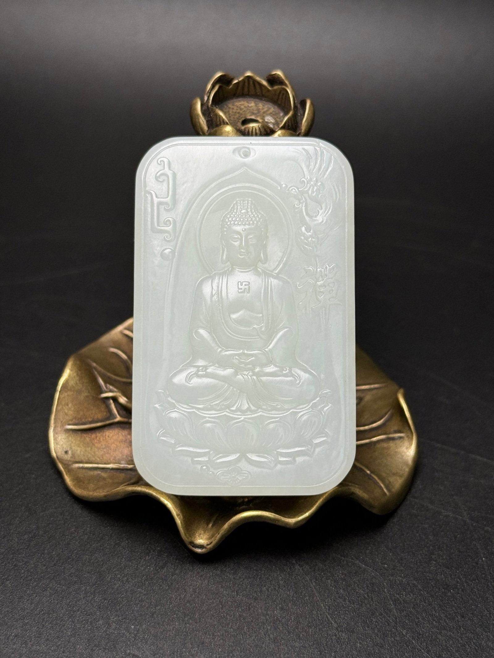 An Exquisite White Jade Statue of Mah?vairocana Pattern Pendant: An Exquisite White Jade Statue of Mahāvairocana Pattern Pendant,Qing Dynasty,China,Size:61mmx38mmx9mm,Weight:56g 白玉大日如来像纹挂件,&